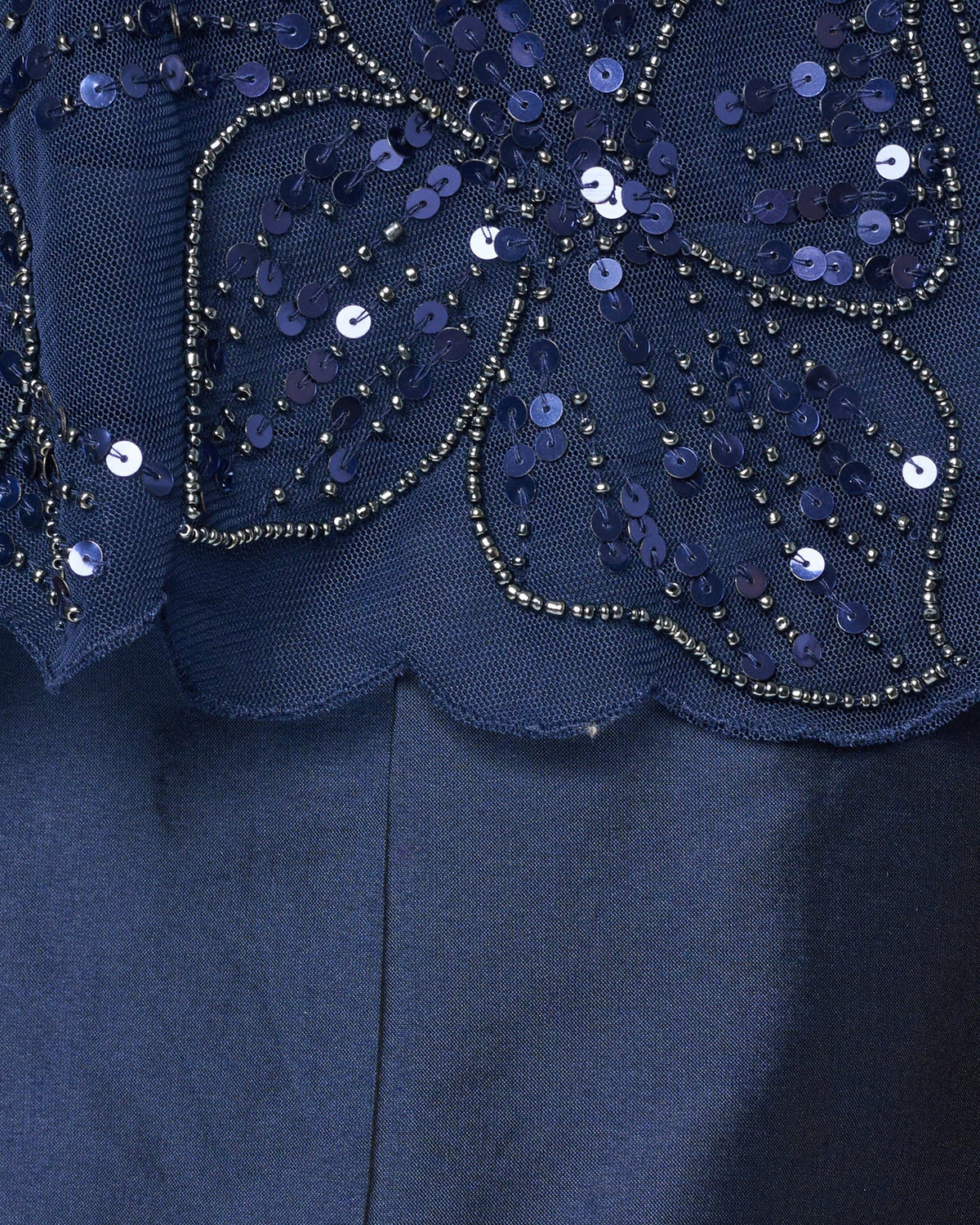 Blue sequin floral appliques on sheer mesh overlay front bodice