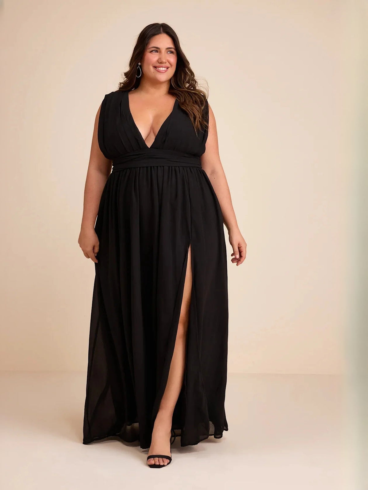 Black sleeveless V-neck A-line maxi dress with ruched waist and front slit