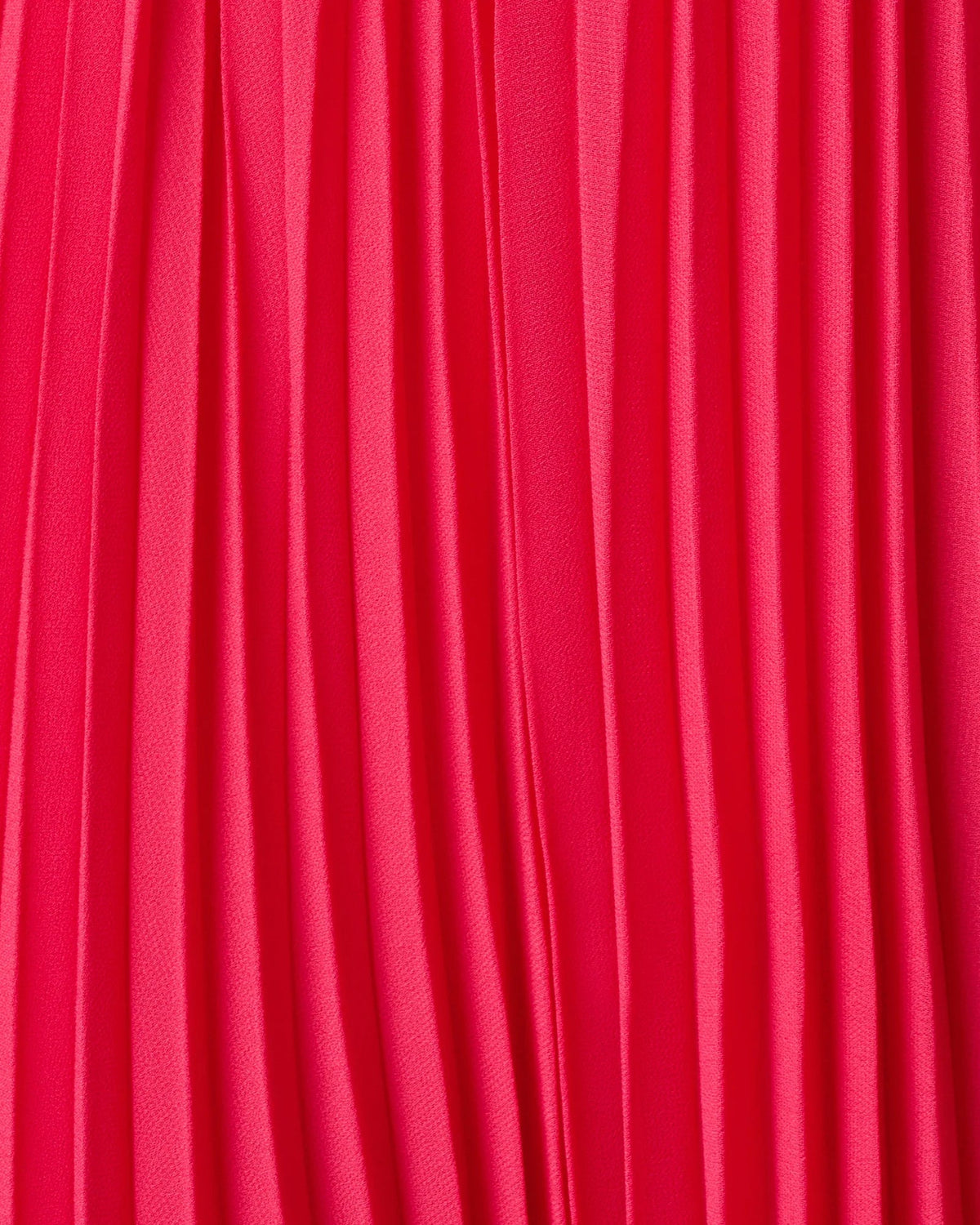 Close-up of cherry red pleated fabric texture