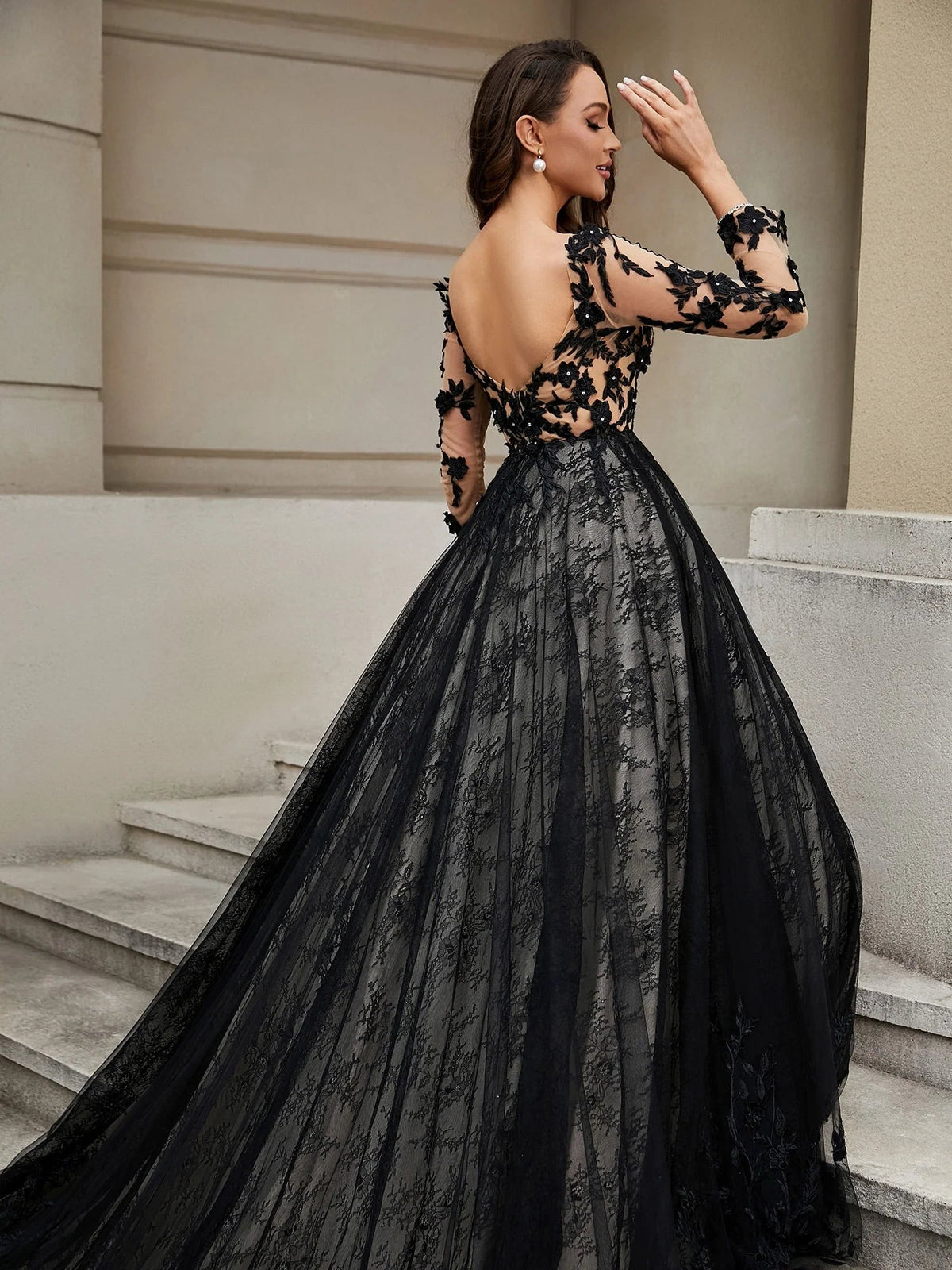 Black V-neck tulle wedding dress with open back and floral applique A-line floor-length skirt