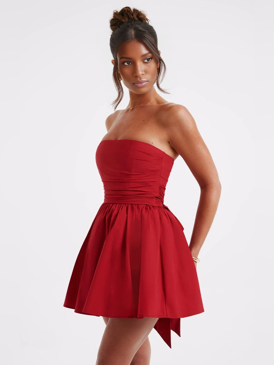 Red strapless mini A-line dress with ruched bodice and pleated tulle skirt