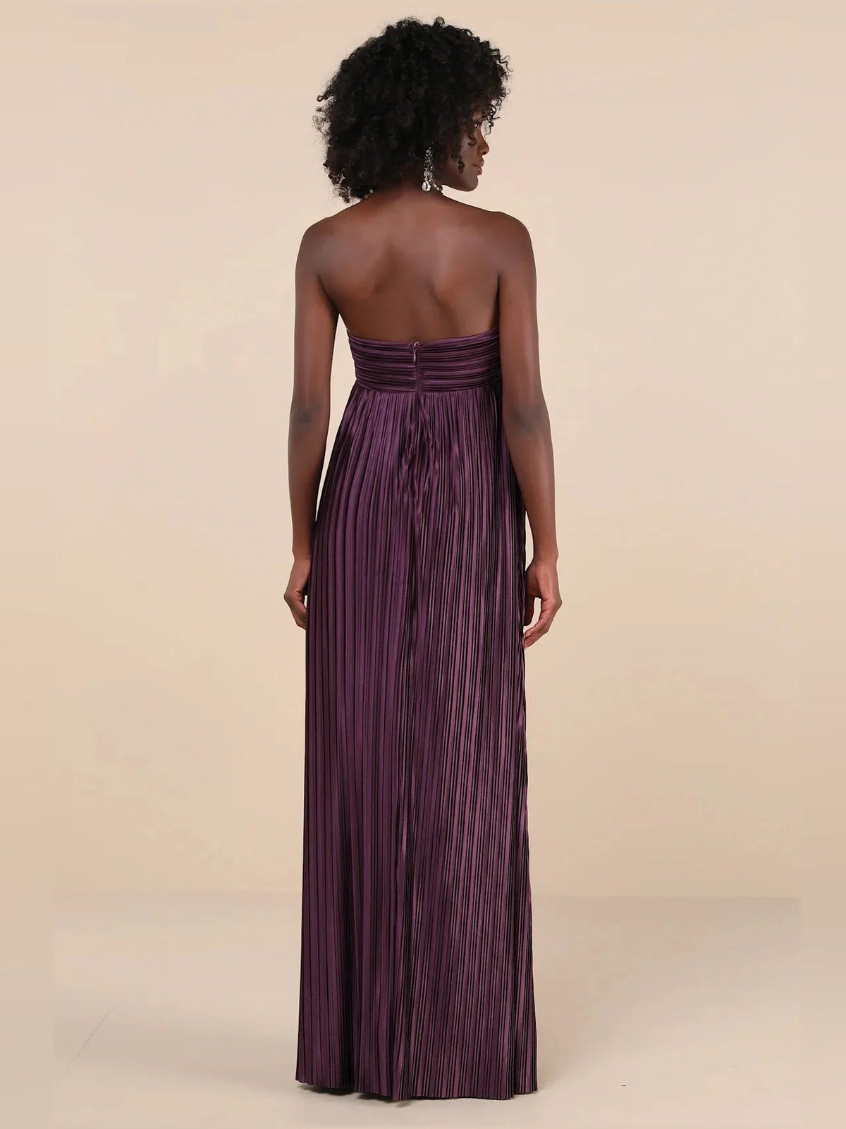 Deep purple strapless satin maxi dress with gathered back detail and pleated skirt