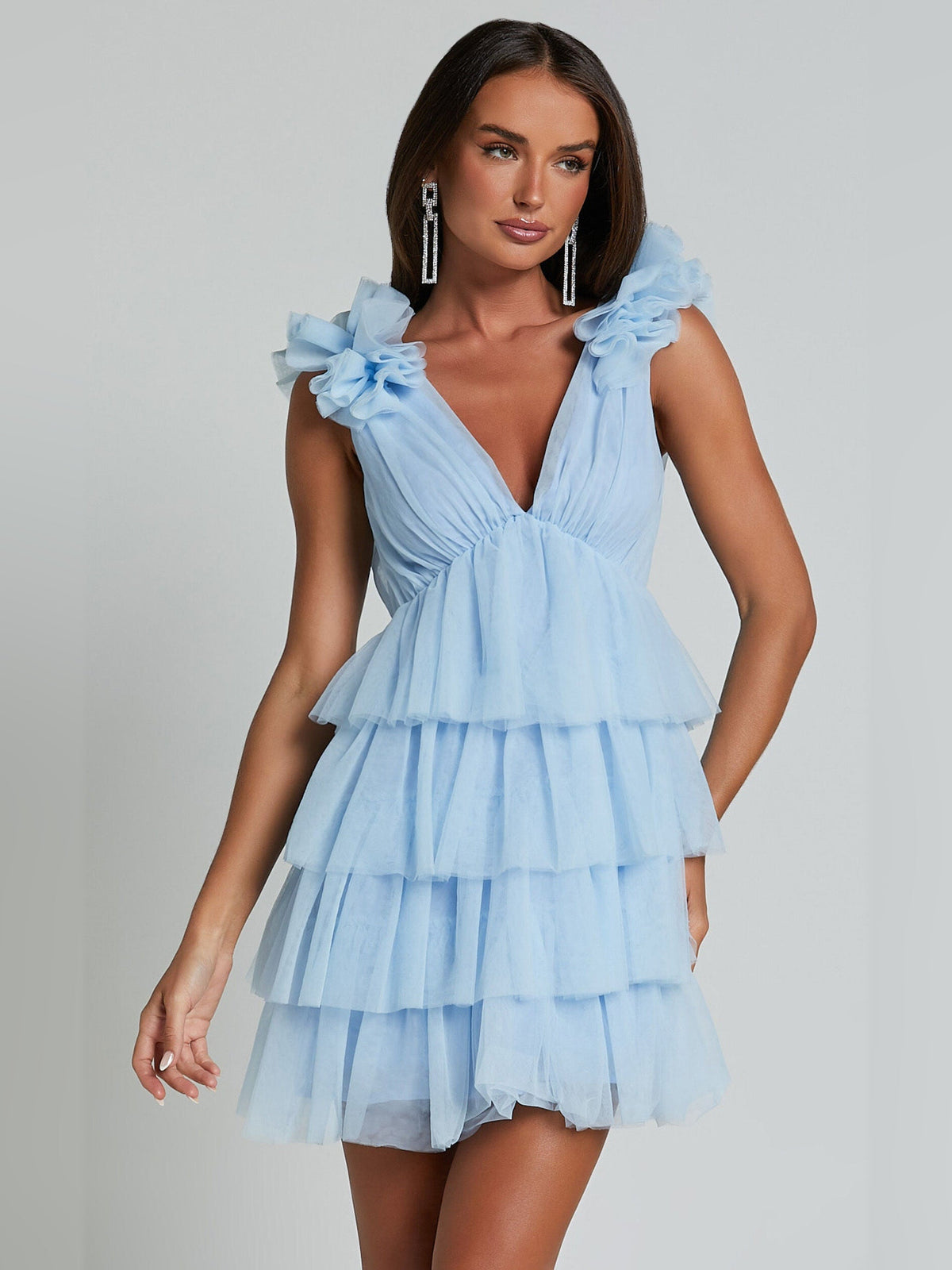 Light blue tiered tulle mini dress with deep V-neck and ruffle cap sleeves