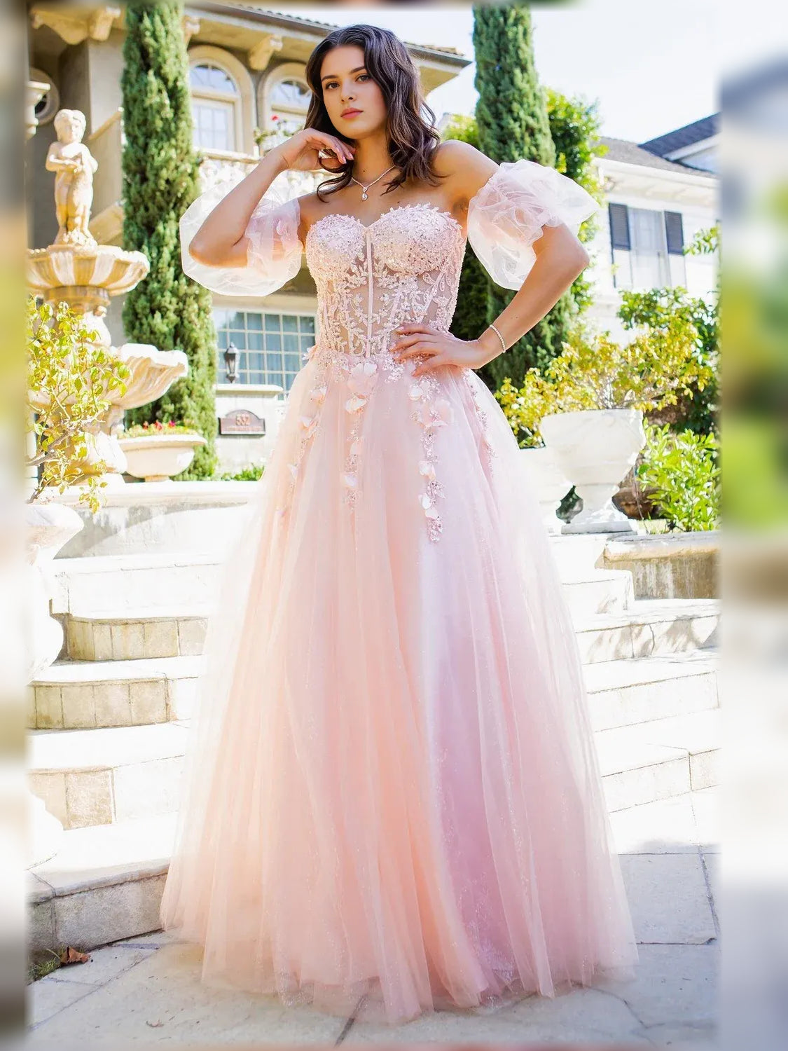 Blush pink floral off-the-shoulder formal dress with puff sleeves and embroidered skirt