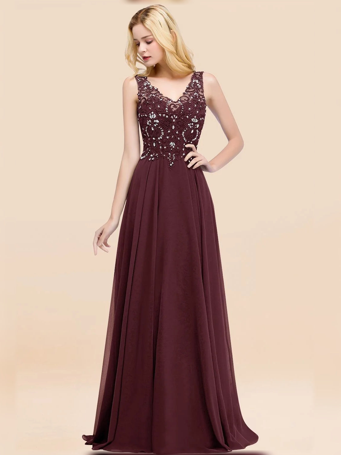 Burgundy sleeveless V-neck chiffon A-line bridesmaid dress with lace bodice and full skirt.