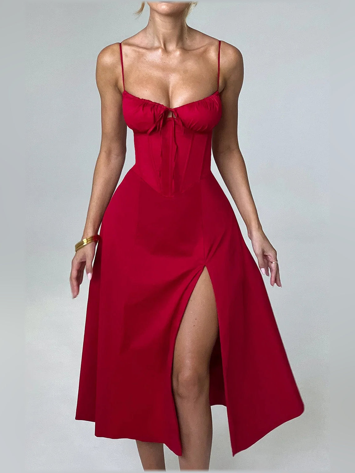 Red midi formal dress with tie-bust detail, spaghetti straps, and asymmetrical front slit