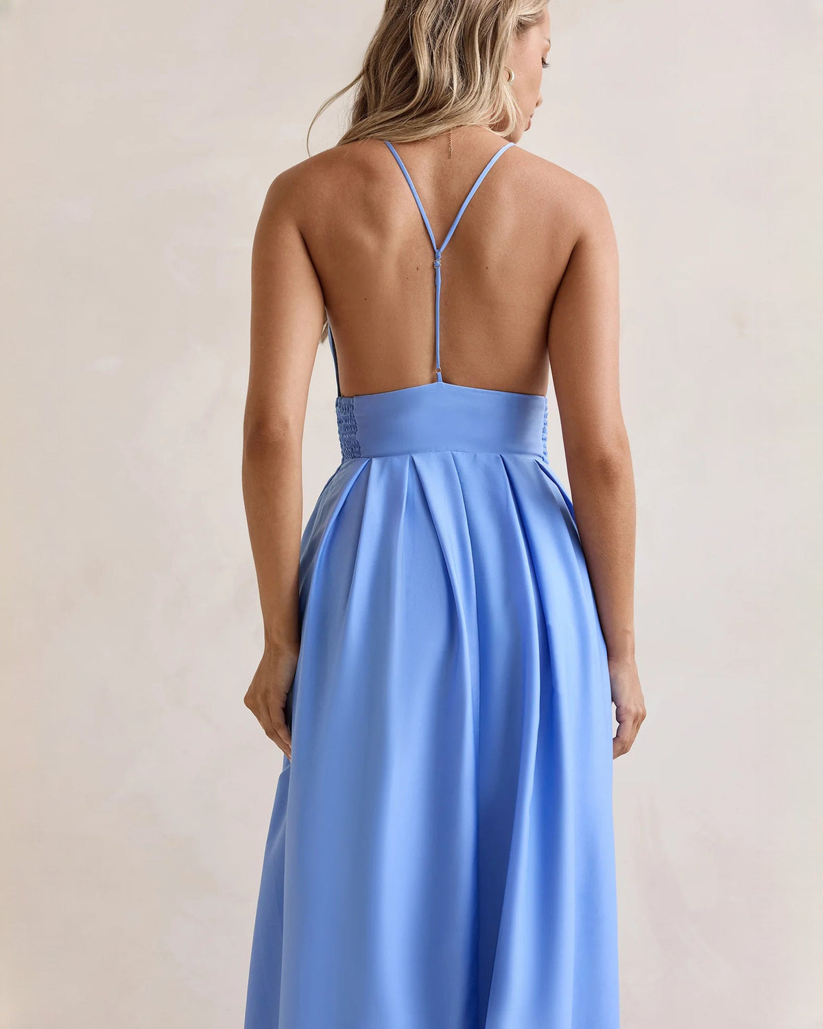 Periwinkle blue chiffon maxi dress back view with V-back straps and gathered waist