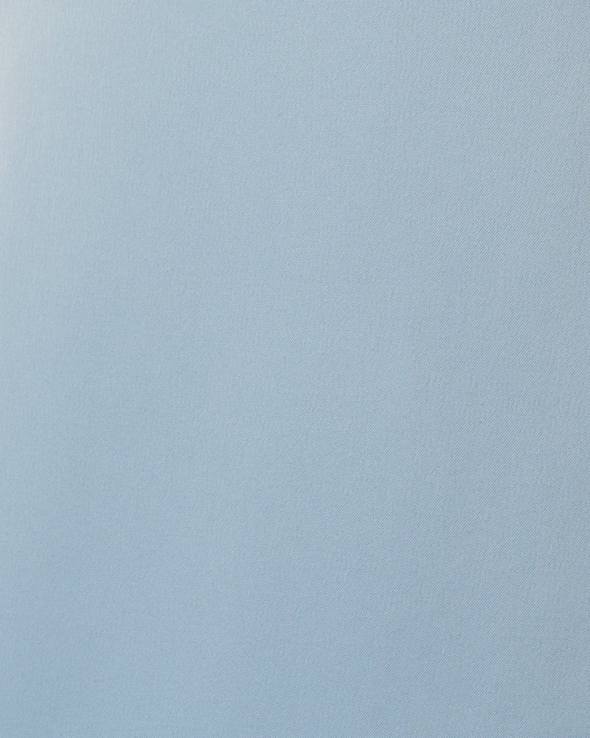 Powder blue fabric close-up with fine textured weave