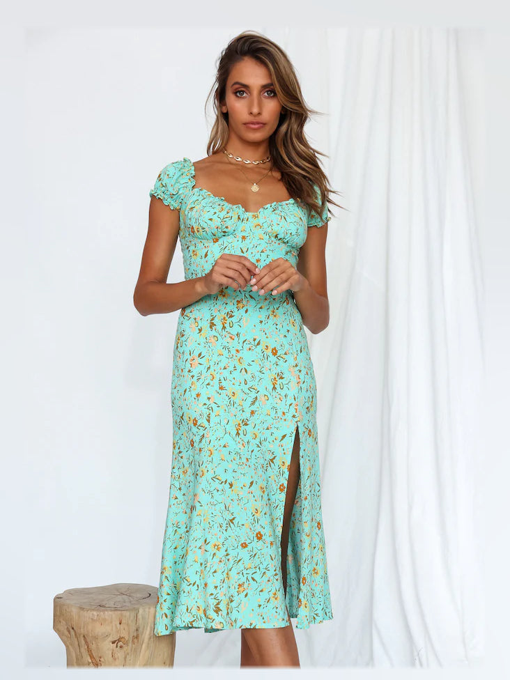 Aqua floral midi off-shoulder dress close-up, ruffle sleeves and sweetheart neckline.