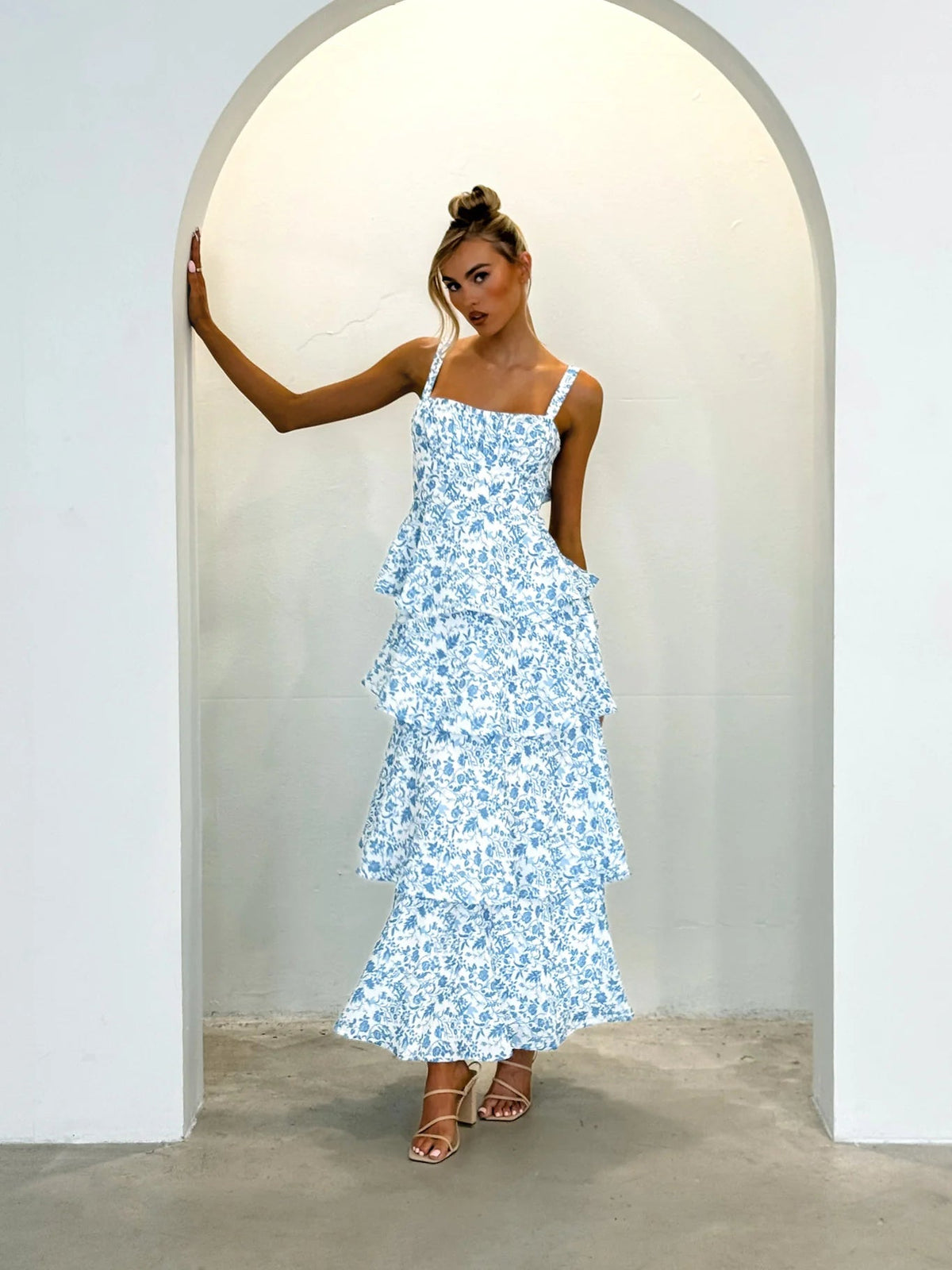 Blue floral tiered midi dress with square neckline and stacked ruffle hem