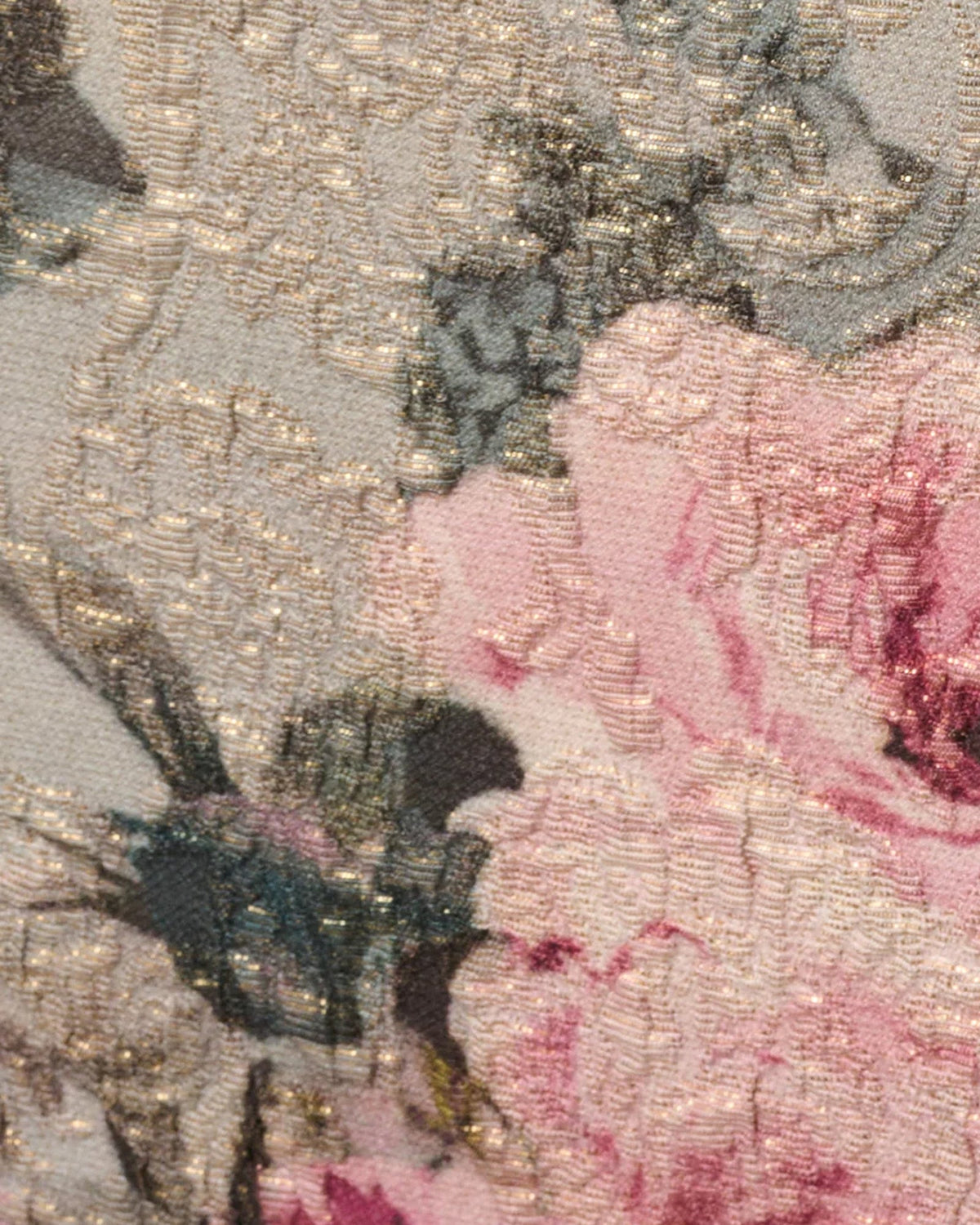 Floral print fabric close-up with pink roses and dark botanical leaves on textured weave