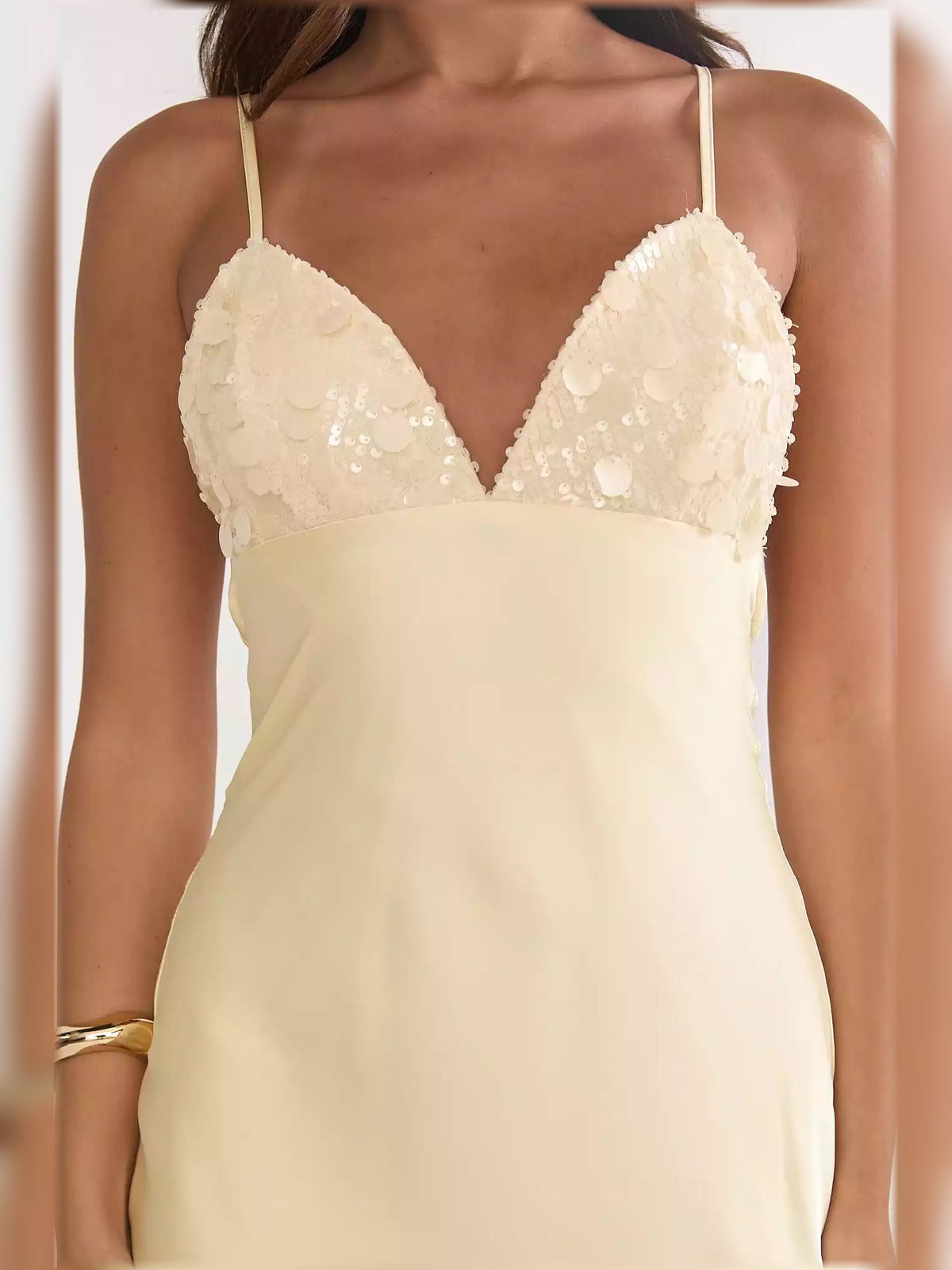 Pale lemon spaghetti strap dress with V-neck lace-sequin cups