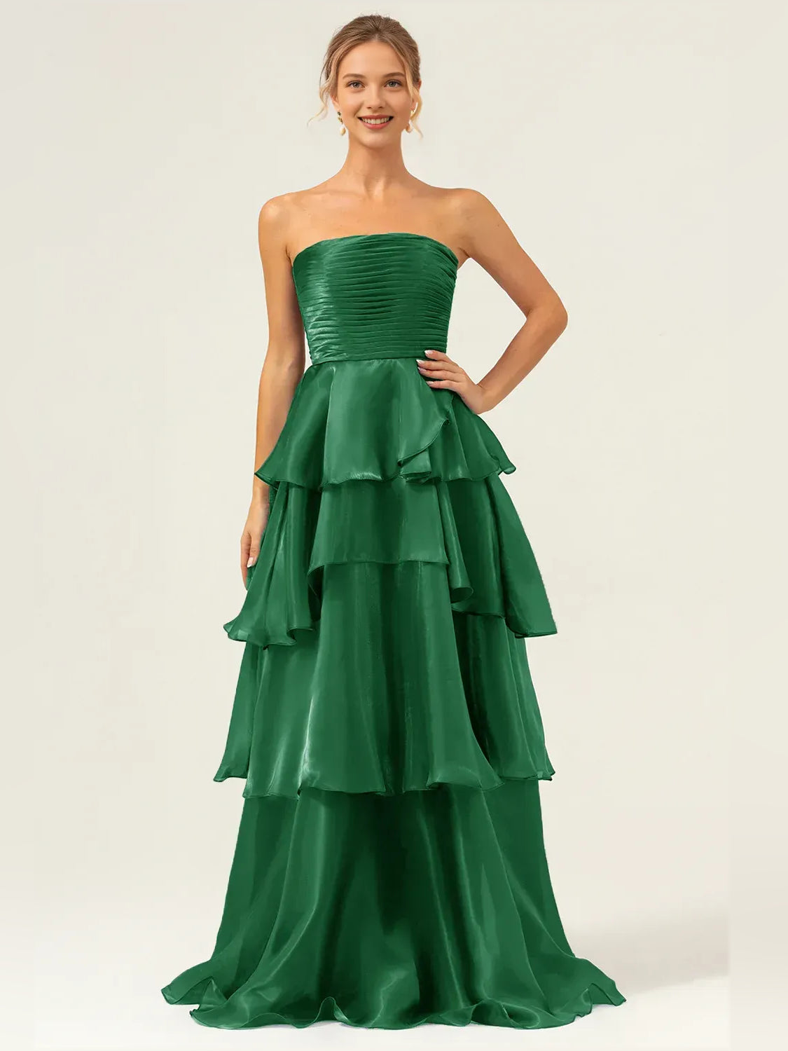 Green strapless tiered prom dress with ruched bodice and layered ruffle skirt, floor length