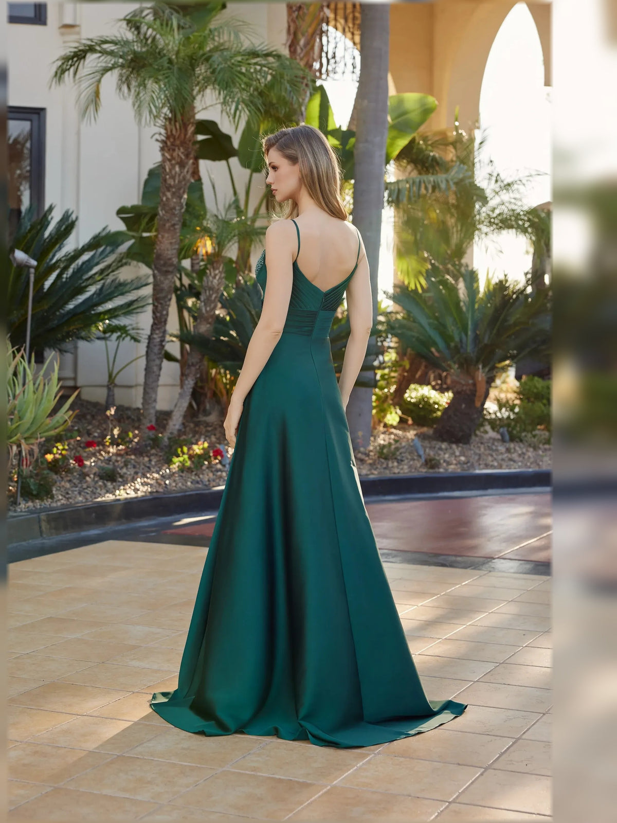 Peacock green A-line formal dress with open back and ruched waist, spaghetti straps