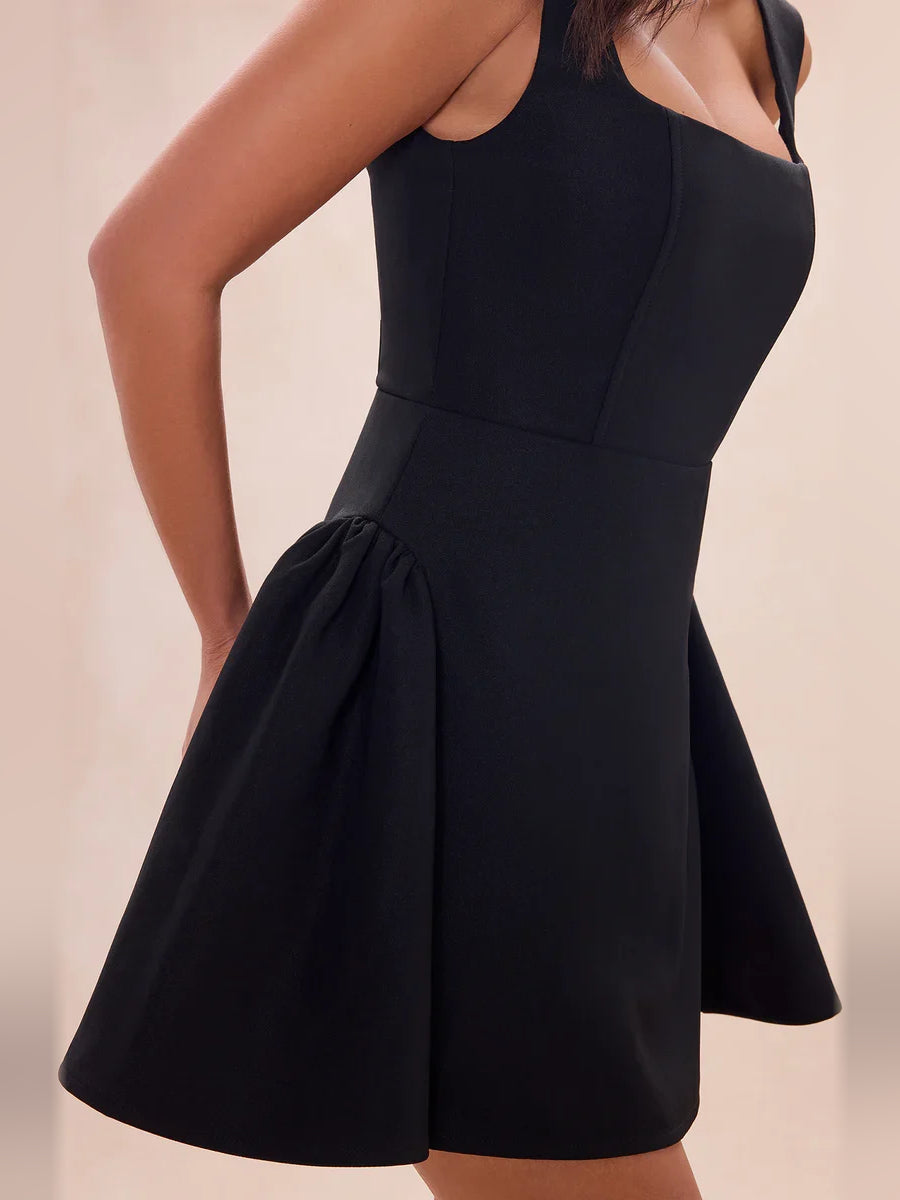 Black pleated square-neck A-line mini dress with flared skirt and sleeveless bodice