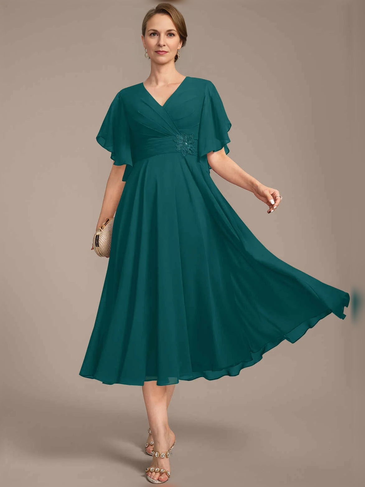 V-neck A-line chiffon dress with draped bodice, pleated skirt, flutter sleeves, teal green