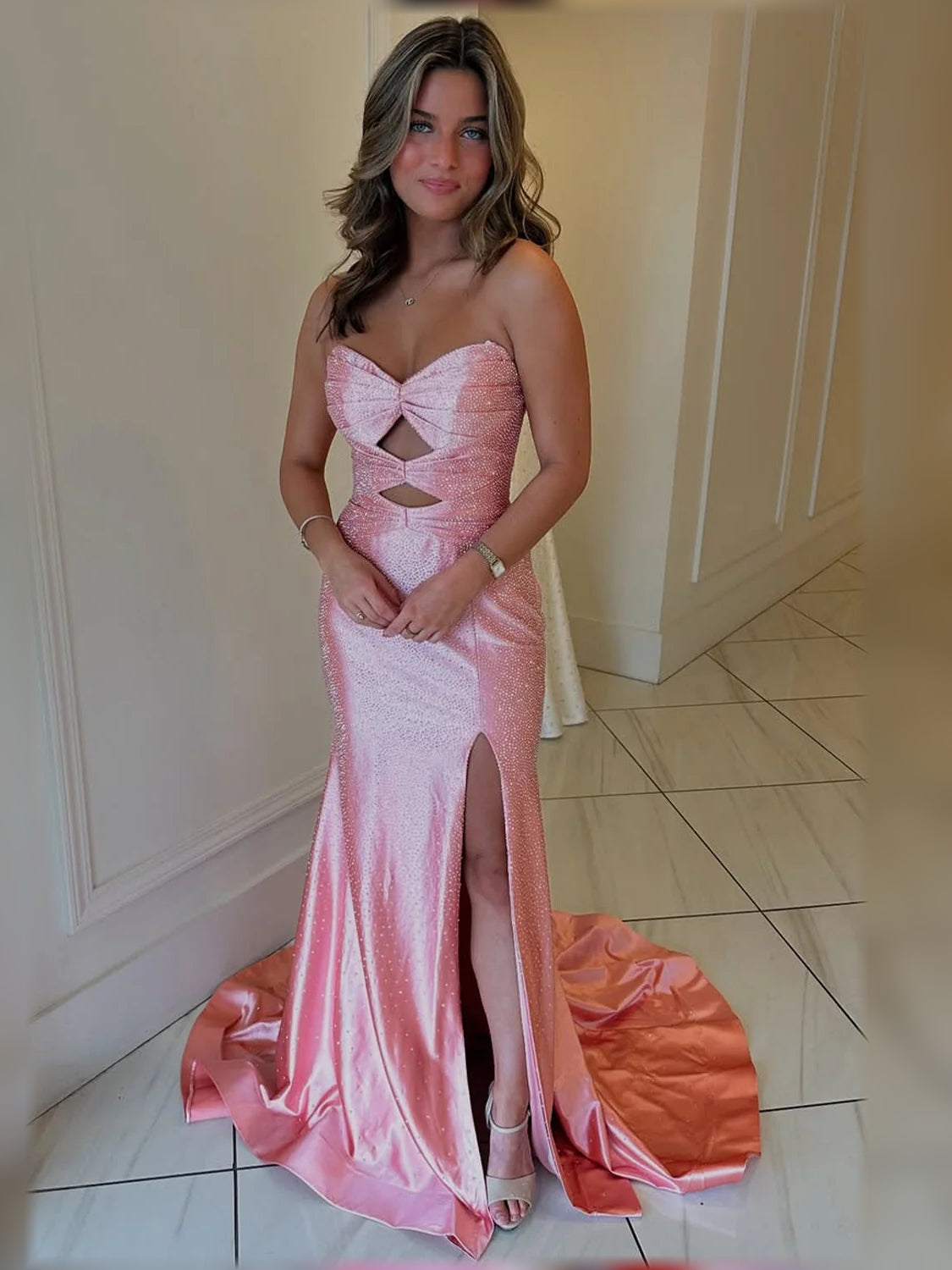 Pink sequin sweetheart formal dress with crisscross cutout bodice and front slit
