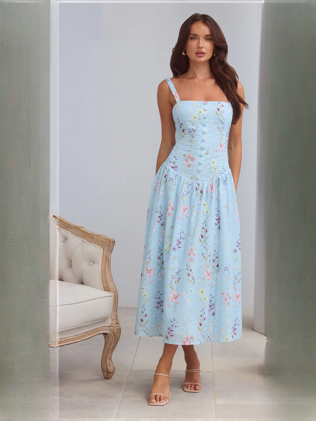 Blue a-line maxi formal dress with floral print, alternate full-length view showing the shoulder line