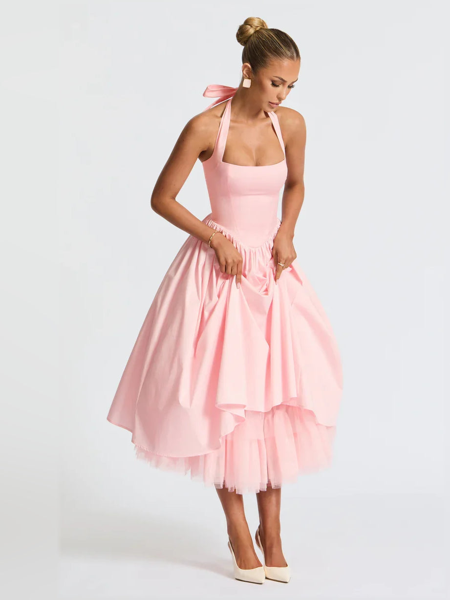 Blush pink halter A-line midi formal dress back view with ribbon ties and pleats