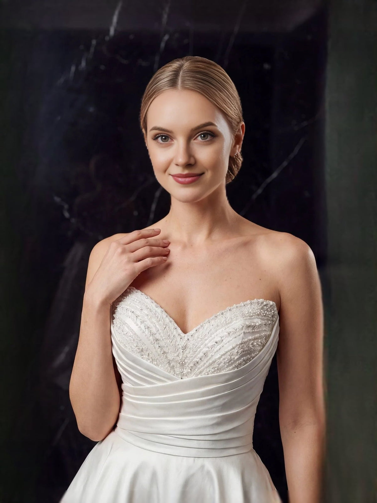 Ivory satin sweetheart wedding dress close-up, beaded bodice and ruched waist