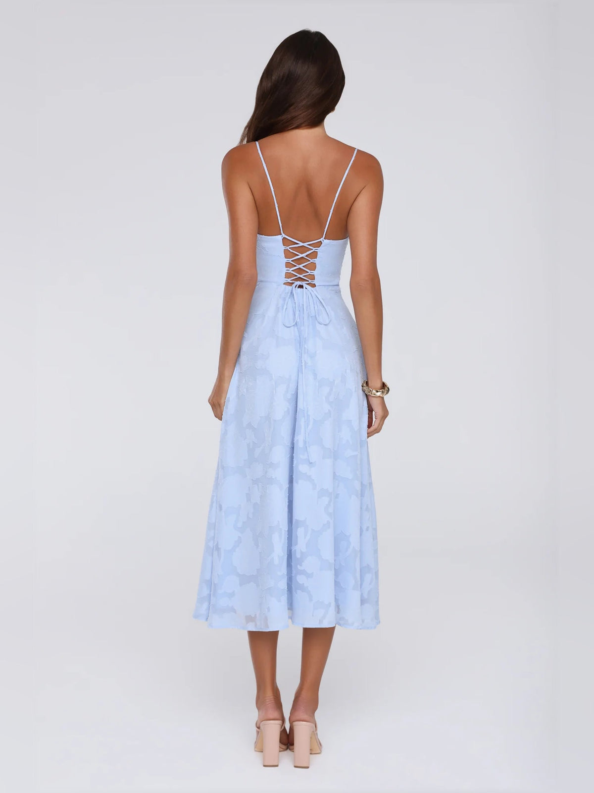 Light blue midi dress with open back and crisscross lacing at the spine