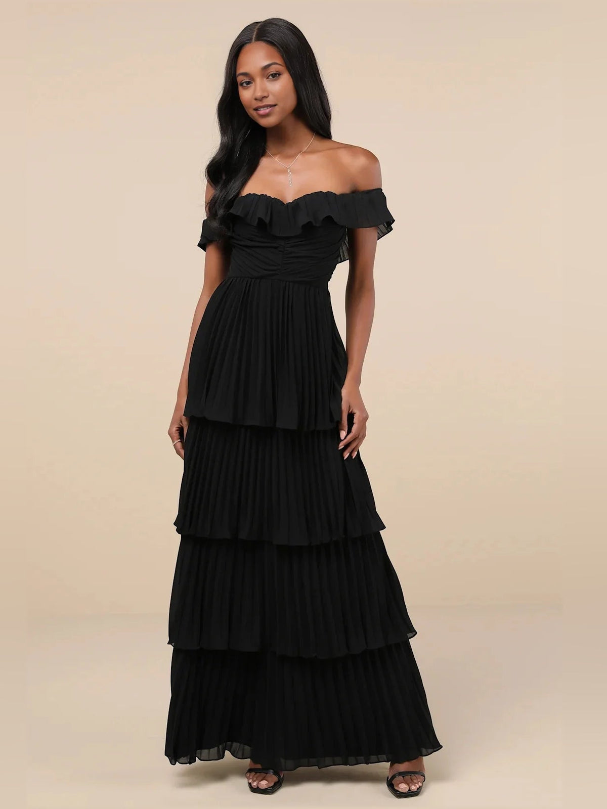 Off-shoulder tiered A-line maxi dress in black with layered ruffle peplum top