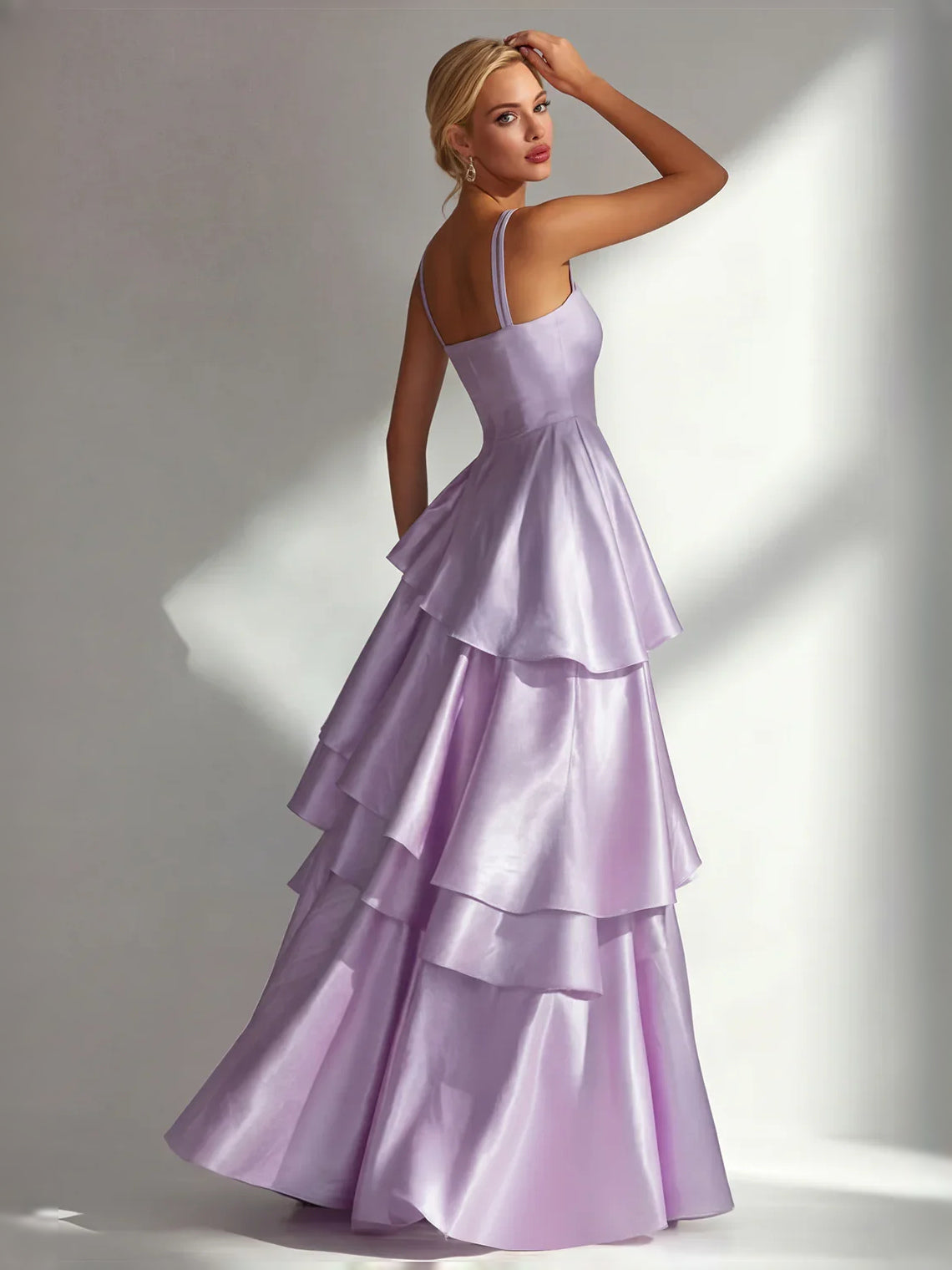 Lilac satin prom dress with square neckline, thin straps, and tiered ruffle skirt layers.