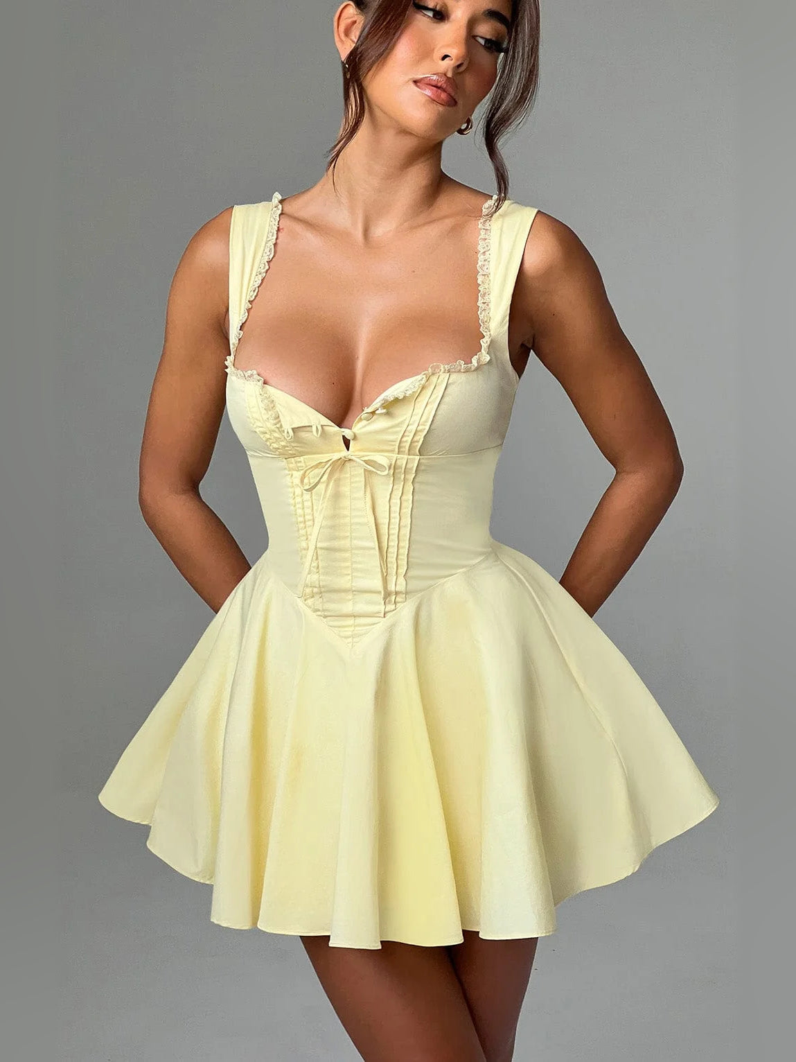 Lemon mini homecoming dress with lace-trimmed sweetheart neckline and flared skirt