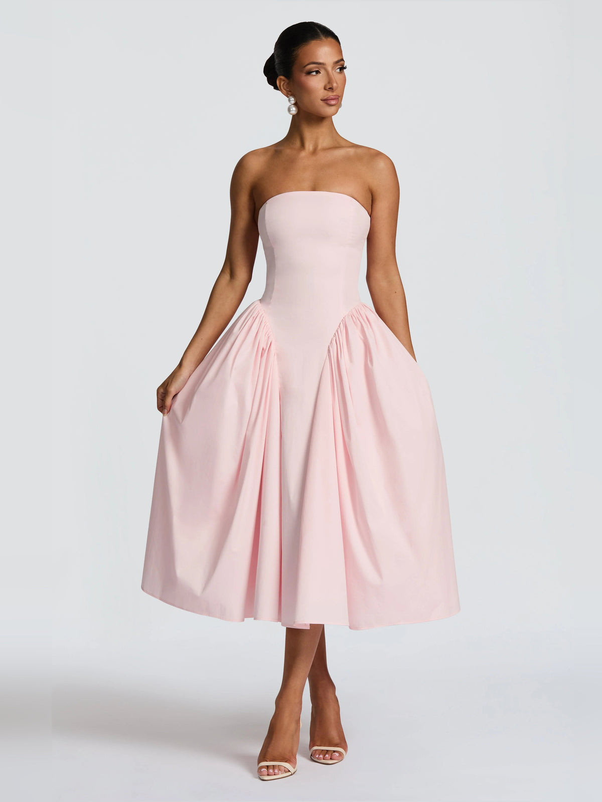 Blush strapless sweetheart midi formal dress with pleated skirt panels
