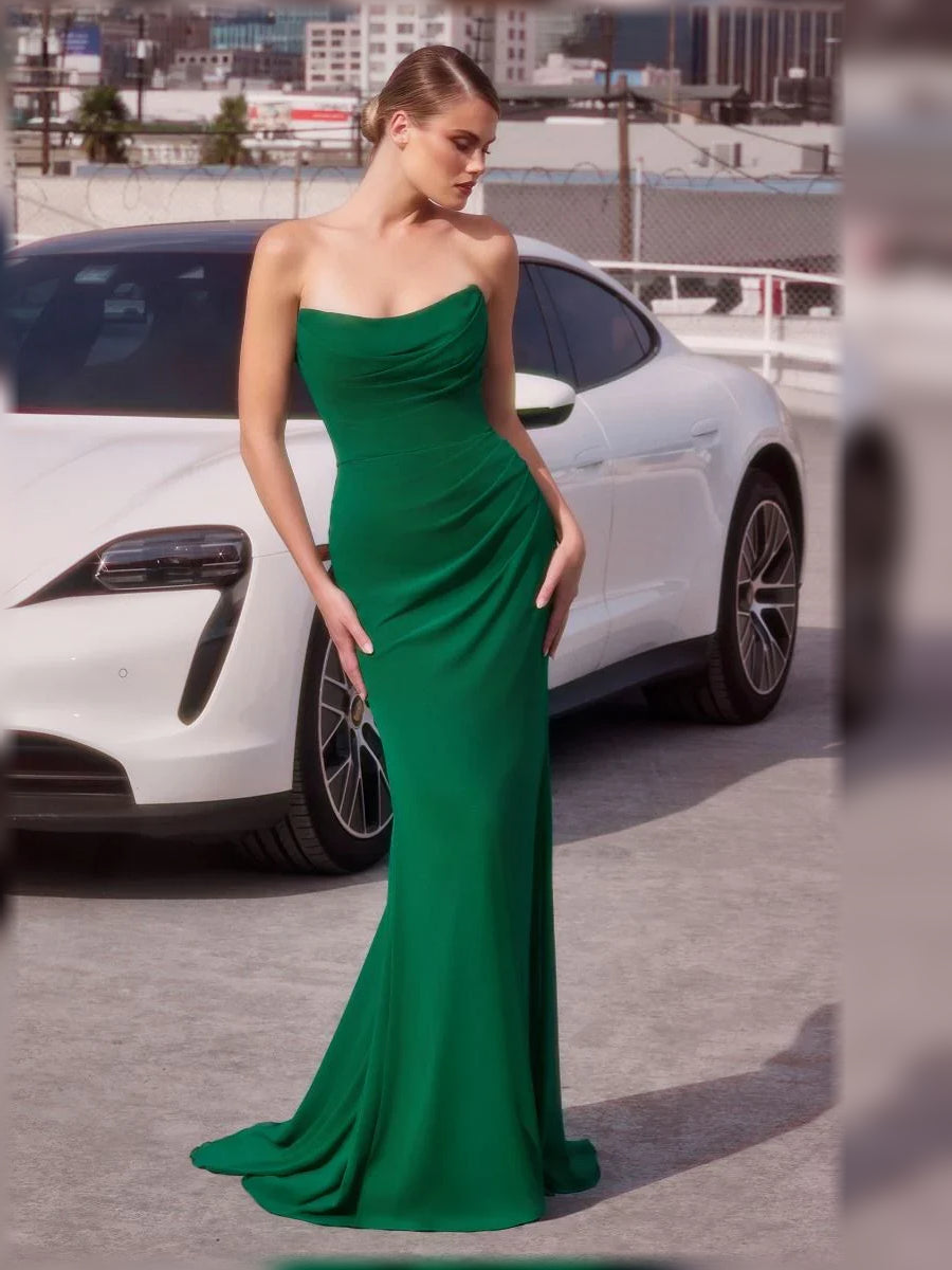 Strapless ruched formal dress in emerald green, floor-length fitted silhouette