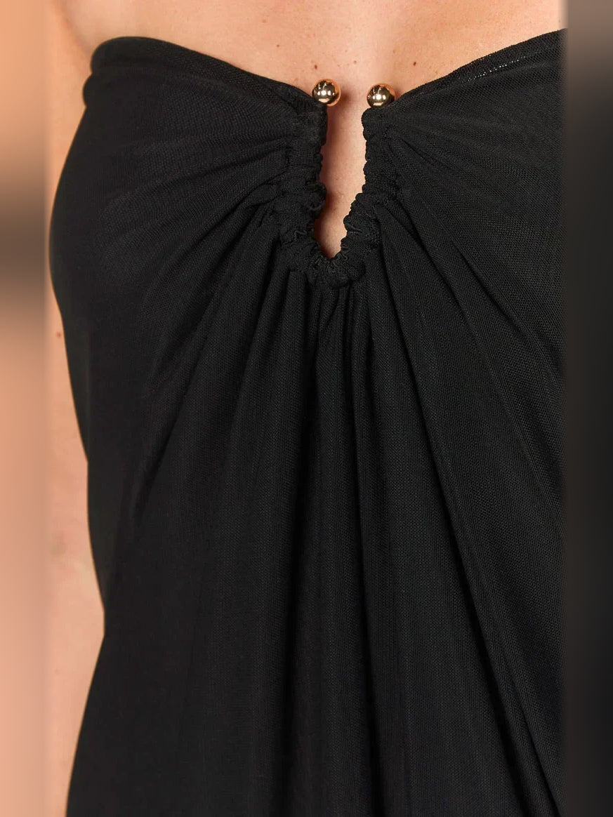 Black strapless mini dress close-up of ruched center cut-out and gathered bust