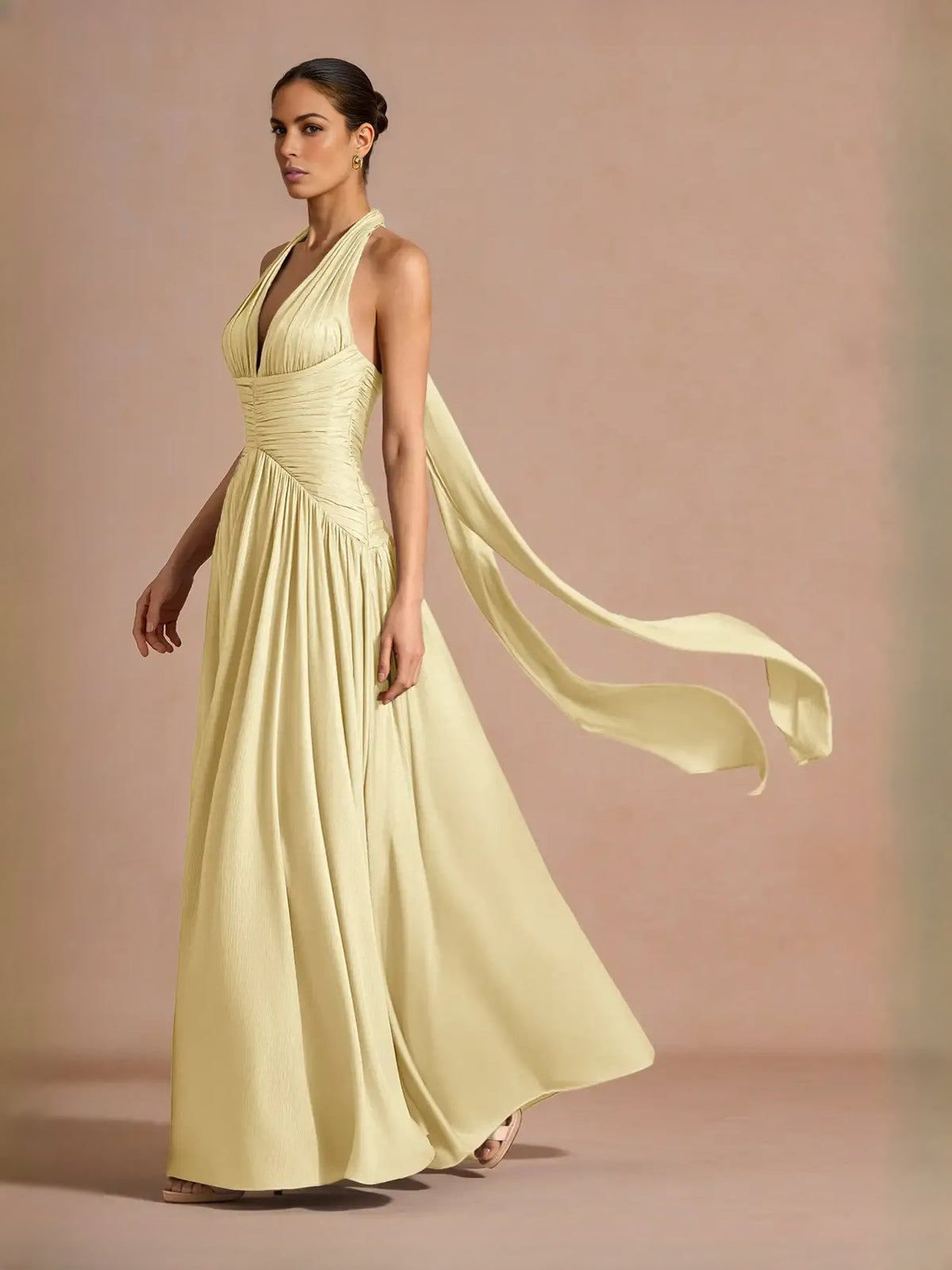 Pale lemon sleeveless halter V-neck maxi prom dress with A-line chiffon skirt and slit