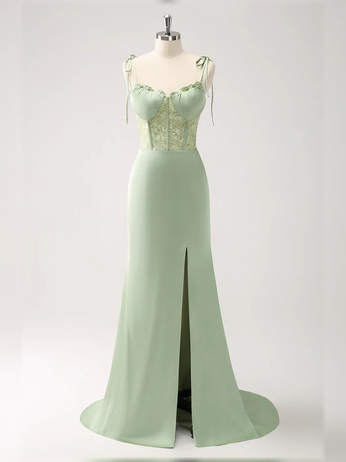 Celadon green floor-length corset gown with side slit and tie-strap bodice