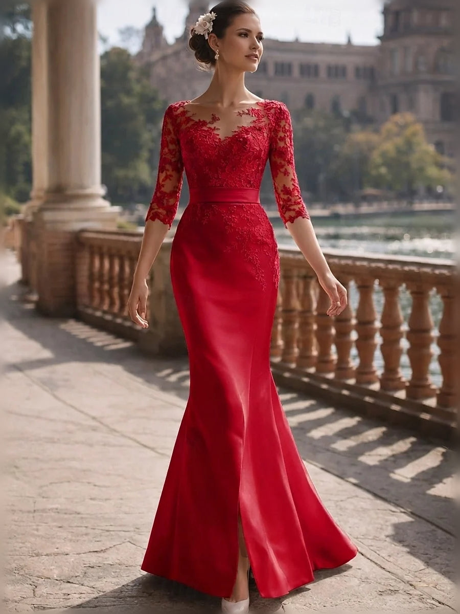 Red satin mermaid gown with floral lace sleeves, V-neck, and front slit