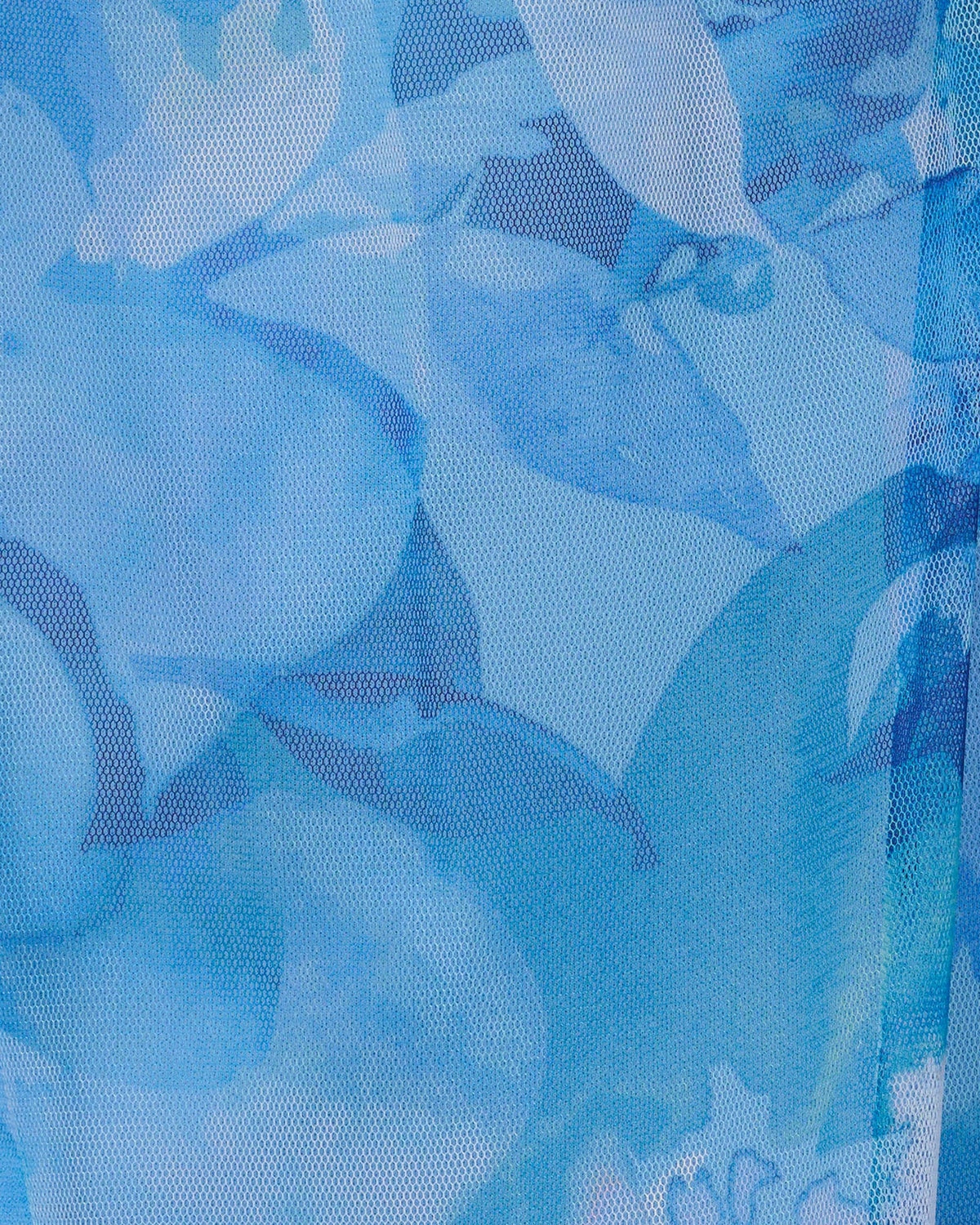 Blue floral fabric detail with layered mesh texture and abstract petal pattern