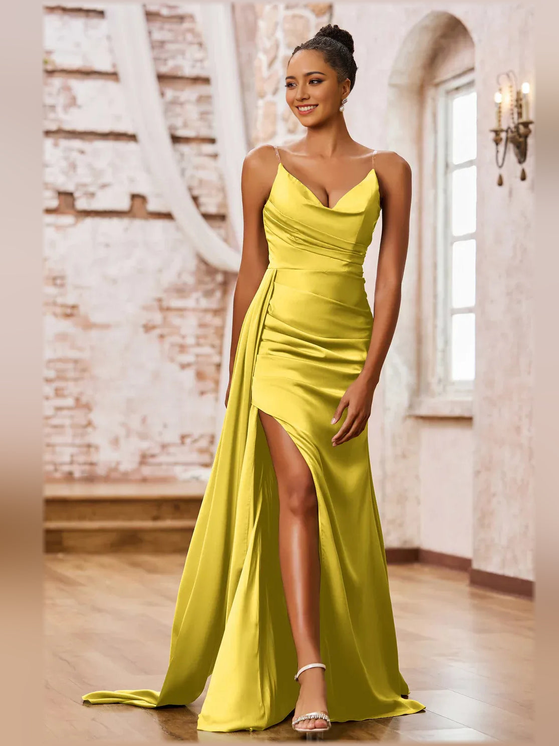 Marigold yellow cowl-neck floor-length gown with spaghetti straps, ruching, and slit