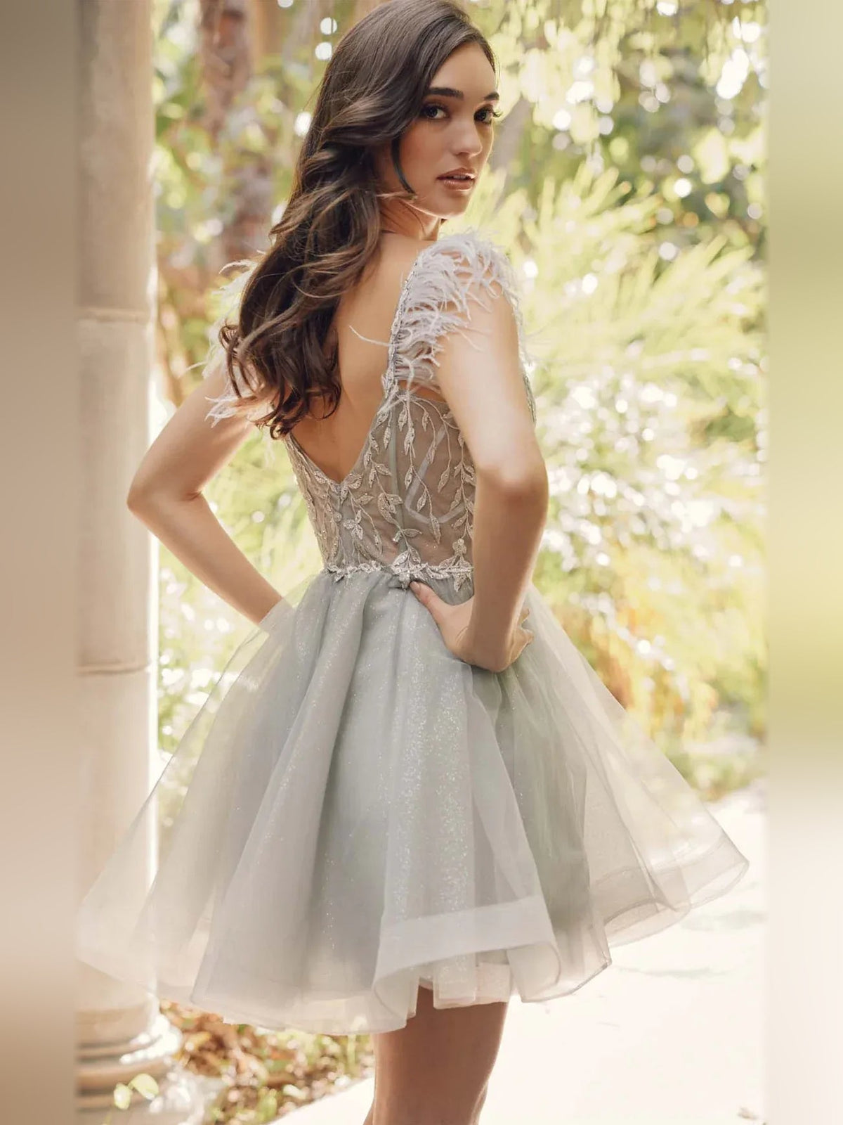 Silver A-line mini tulle dress with lace back detail and short flared skirt