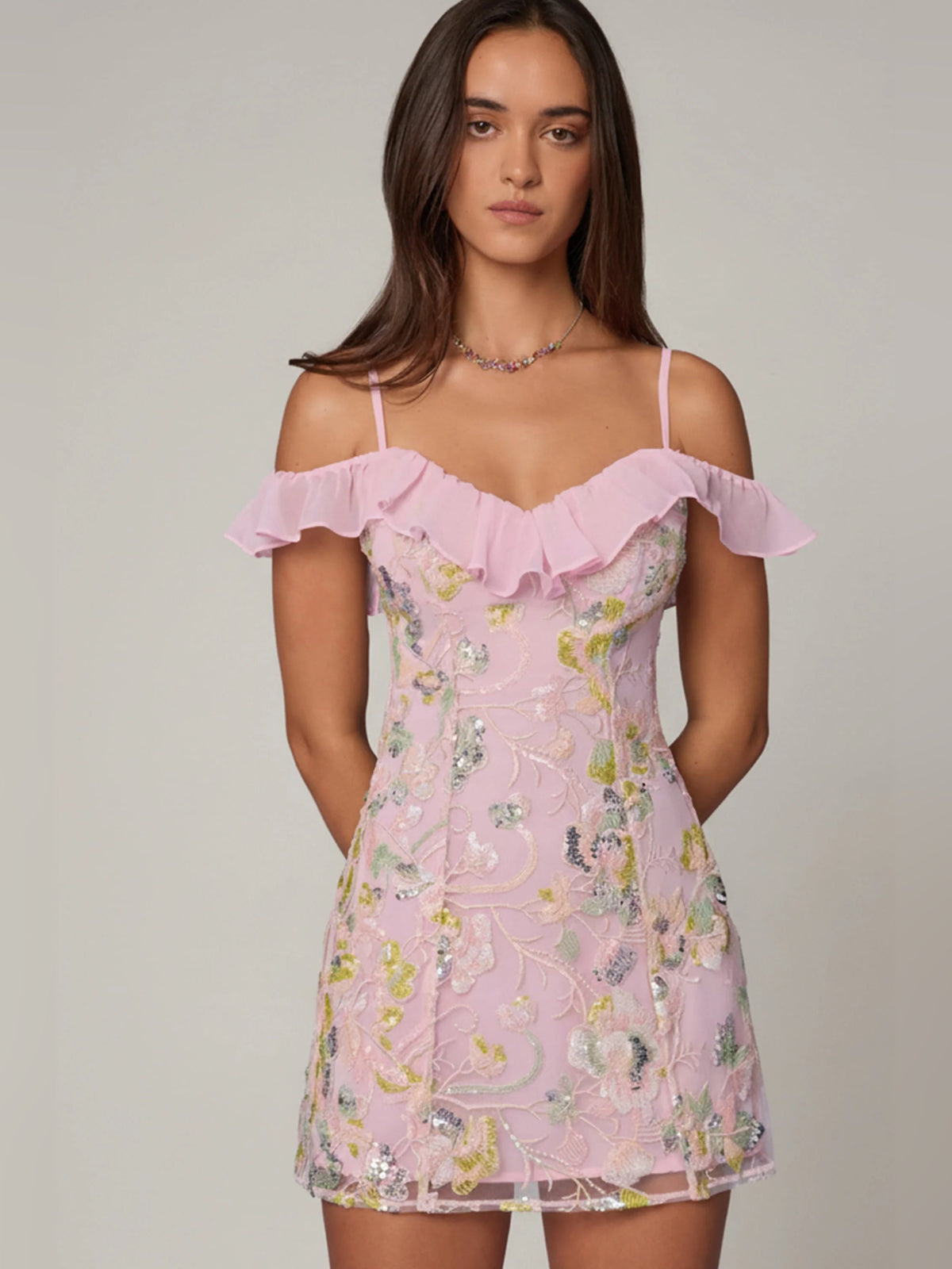 Pink A-line mini dress with layered ruffle off-shoulder and slim sleeveless silhouette