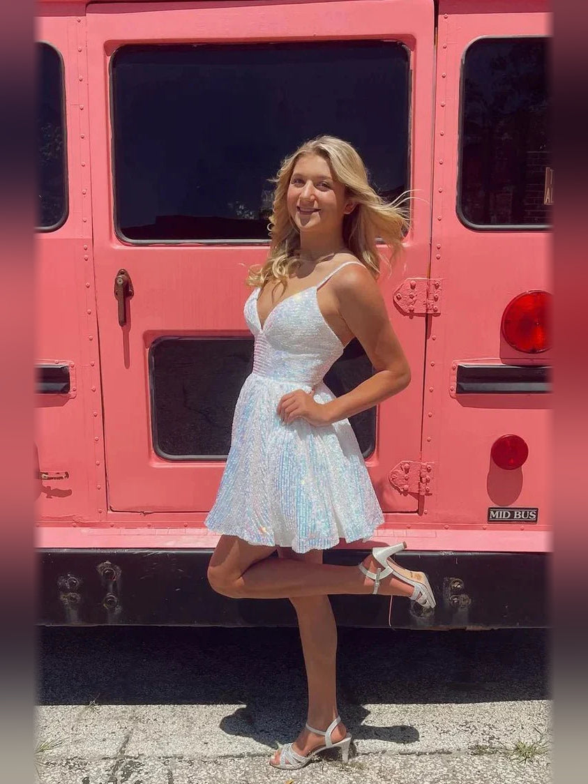 Light blue sequin V-neck A-line mini dress with crisscross back straps and flared hem