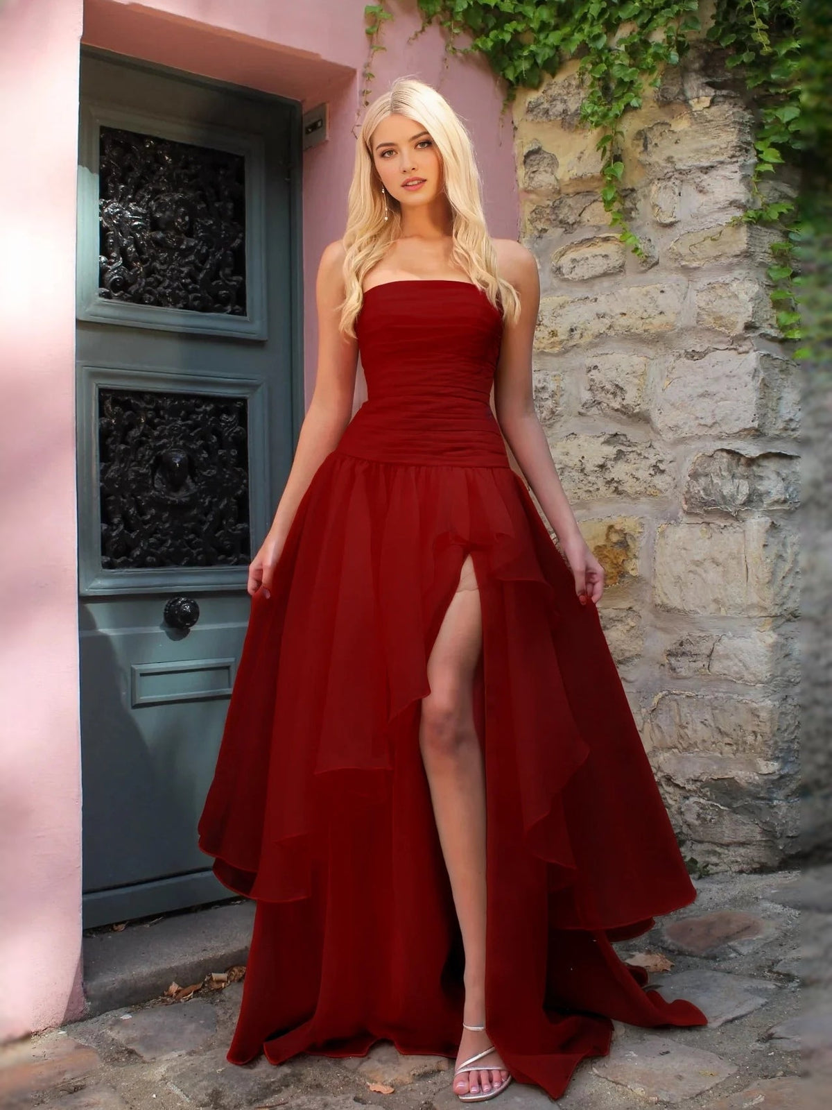 Burgundy red strapless ruched prom dress with layered A-line skirt and front slit