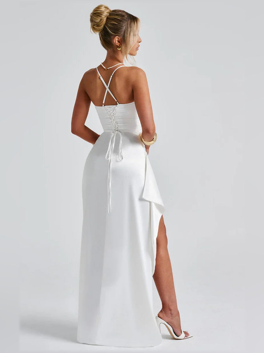 White satin cowl-neck formal dress with ruched bodice, open back, and side slit