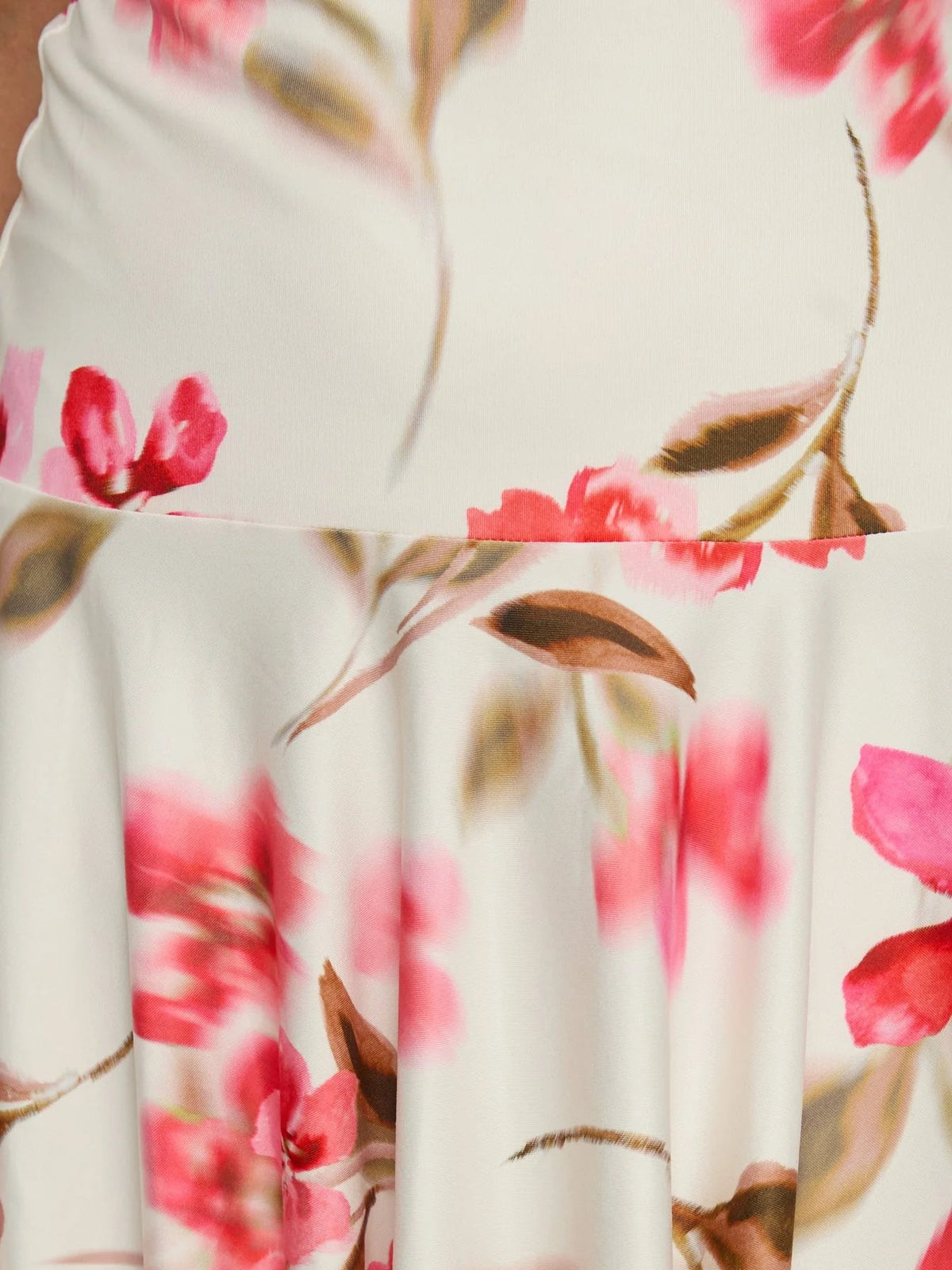 Cream floral halter dress fabric detail with red flower print