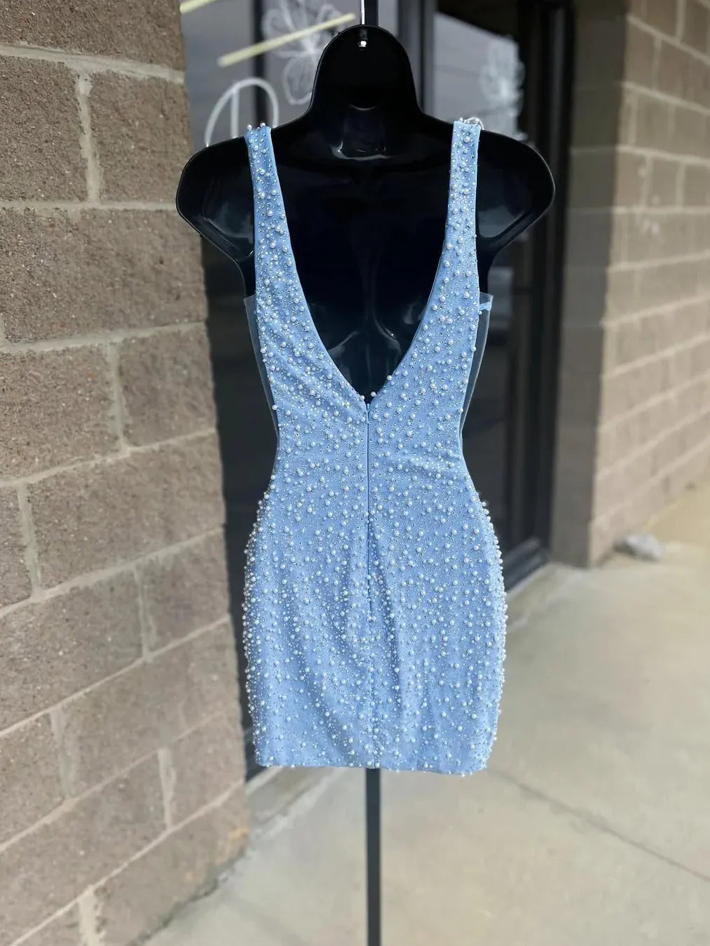 Light blue beaded V-neck mini dress with beaded straps, sleeveless