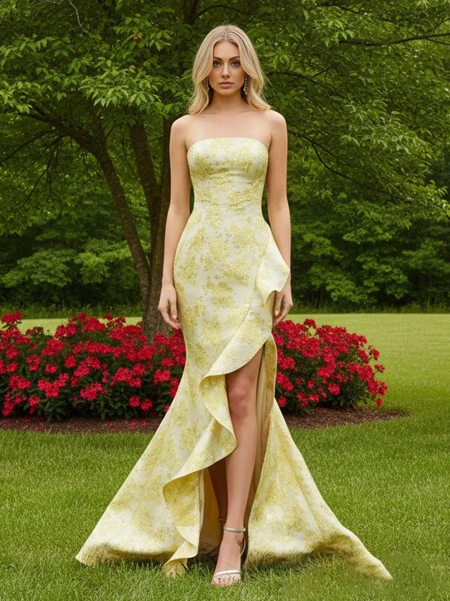 Pale lemon strapless corset mermaid gown with flowing ruffle hem and front slit
