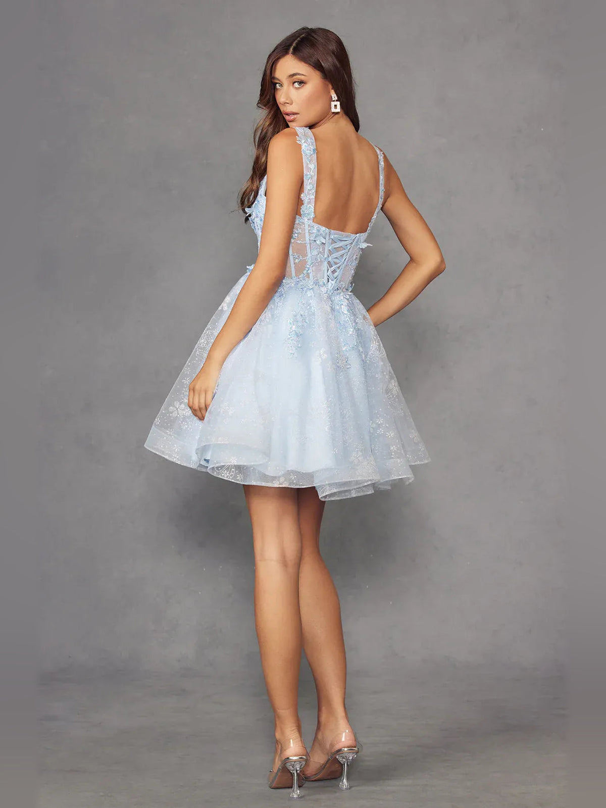 Light blue sleeveless tulle A-line homecoming dress with corset back and floral embellishment