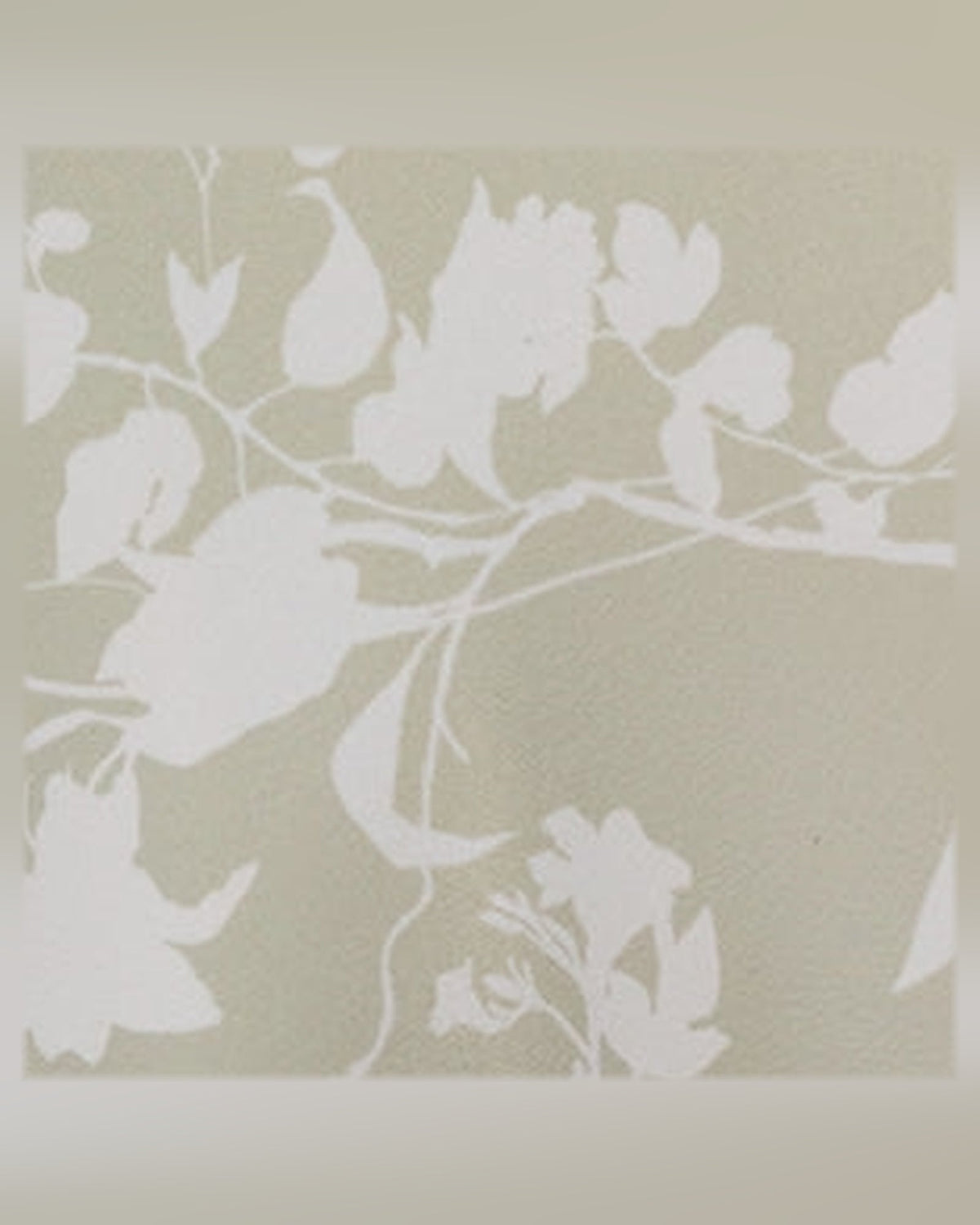 Close-up of light cream fabric with white floral pattern print