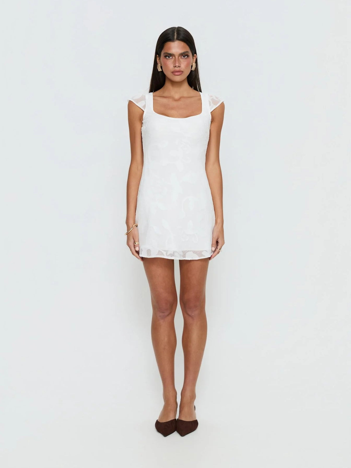 White floral mini dress with square neckline, cap sleeves, fitted bodice, short A-line skirt