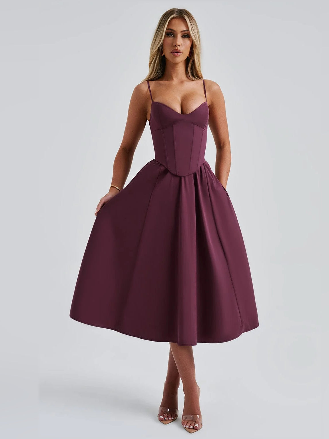 Cherry midi formal dress in a flared pleated silhouette with spaghetti straps and corset waist