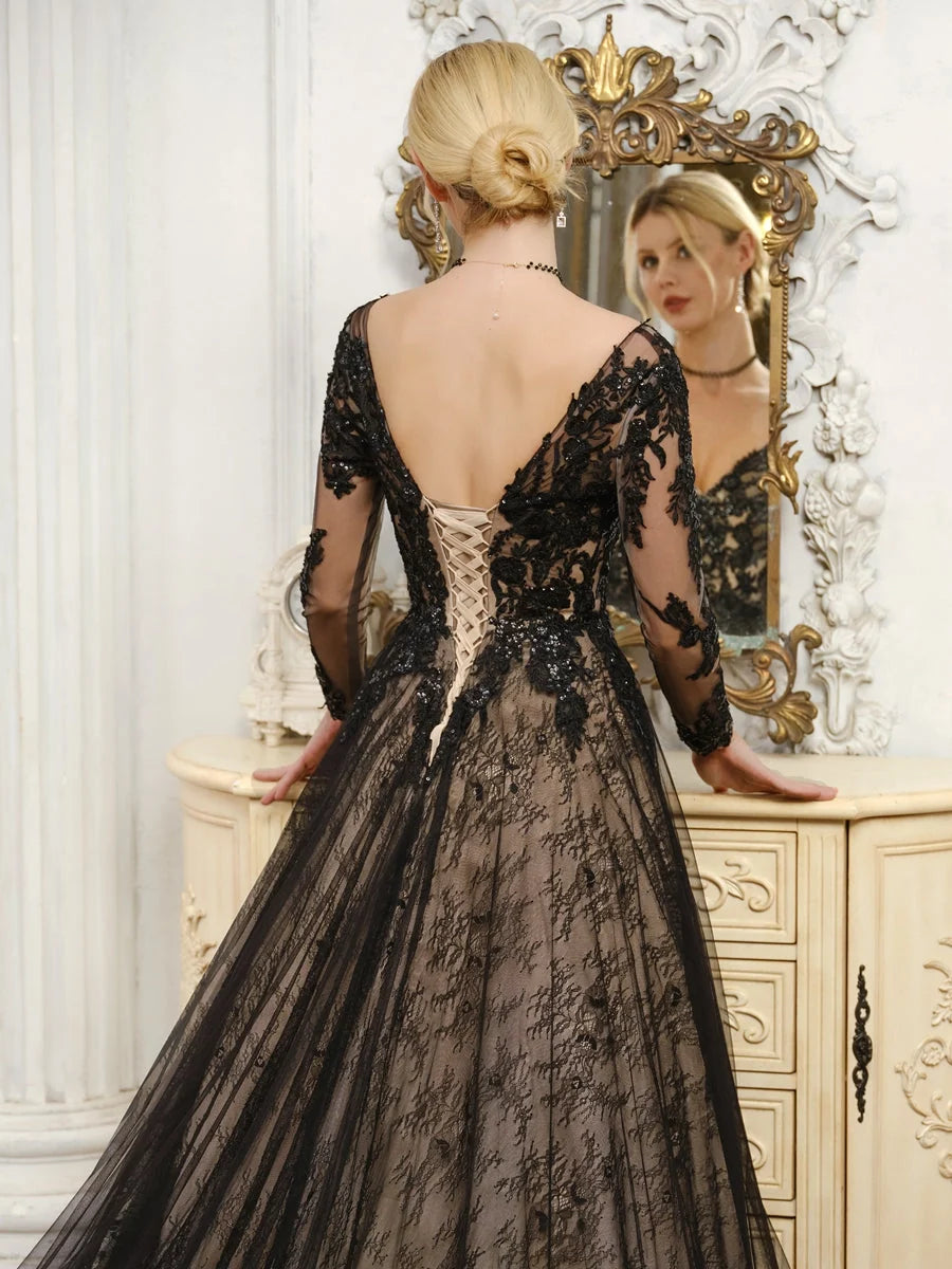 Black sequin A-line wedding dress with open back corset bodice and full tulle skirt
