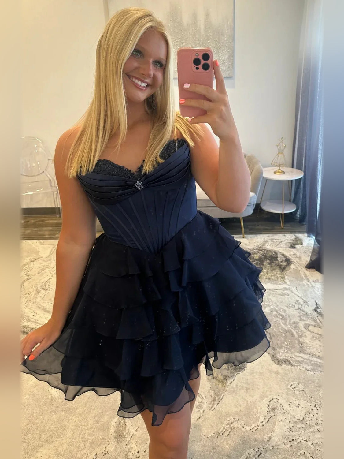 Navy satin corset dress with sweetheart neckline and tiered ruffle skirt
